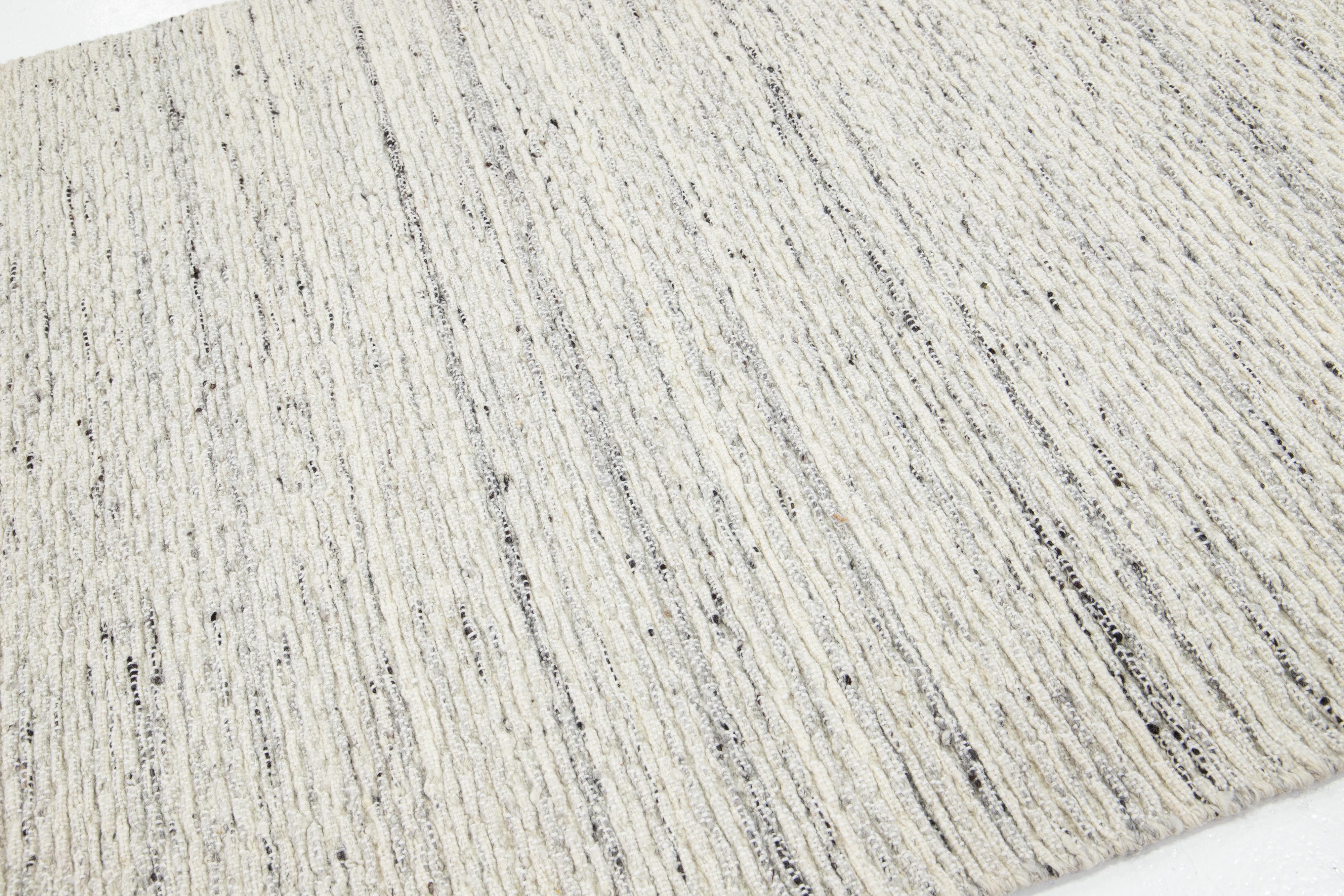 Indian Beige Contemporary Felted Handmade Wool Rug by Apadana For Sale