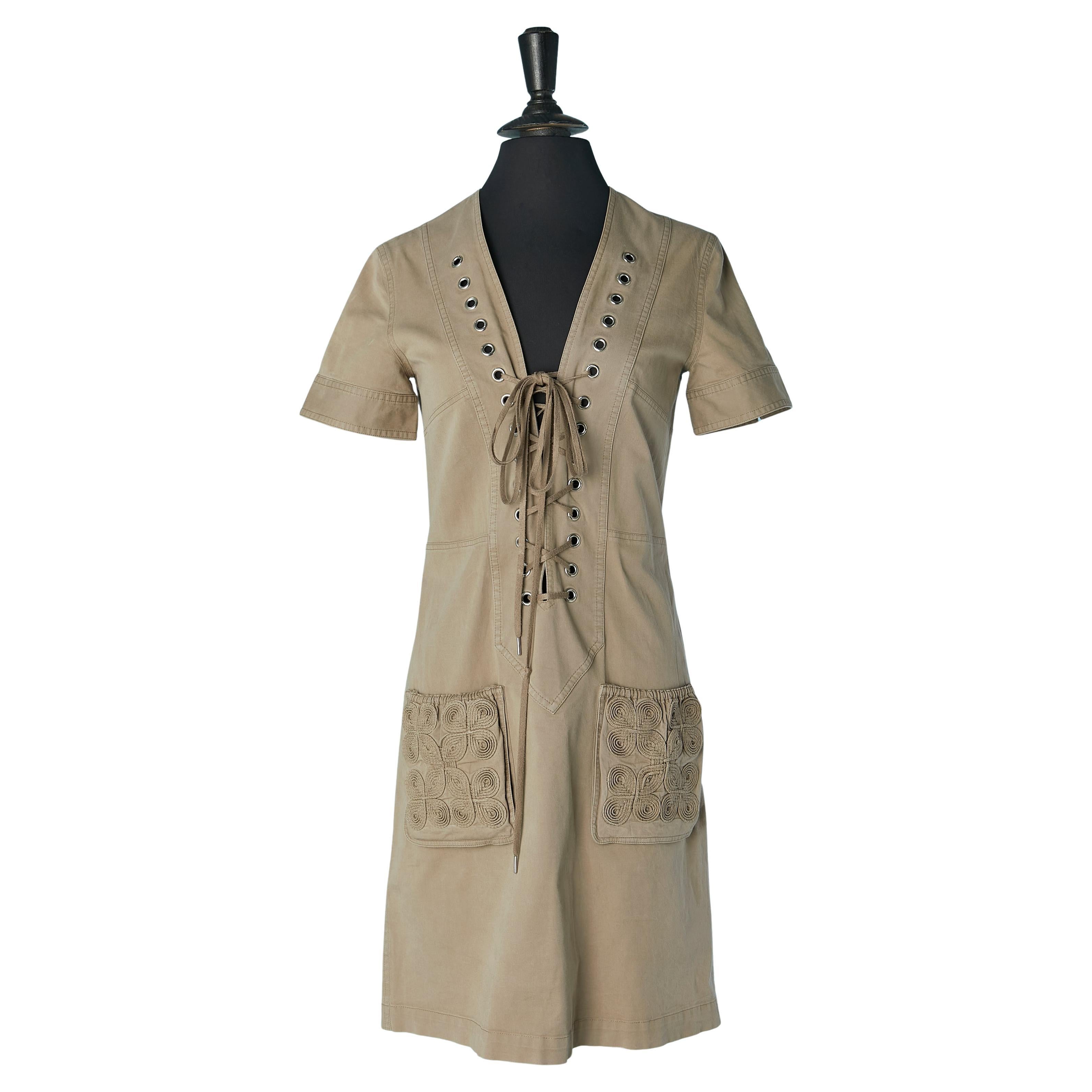 Beige cotton dress with laces and eyelet on the front Jean-Paul Gaultier Femme For Sale