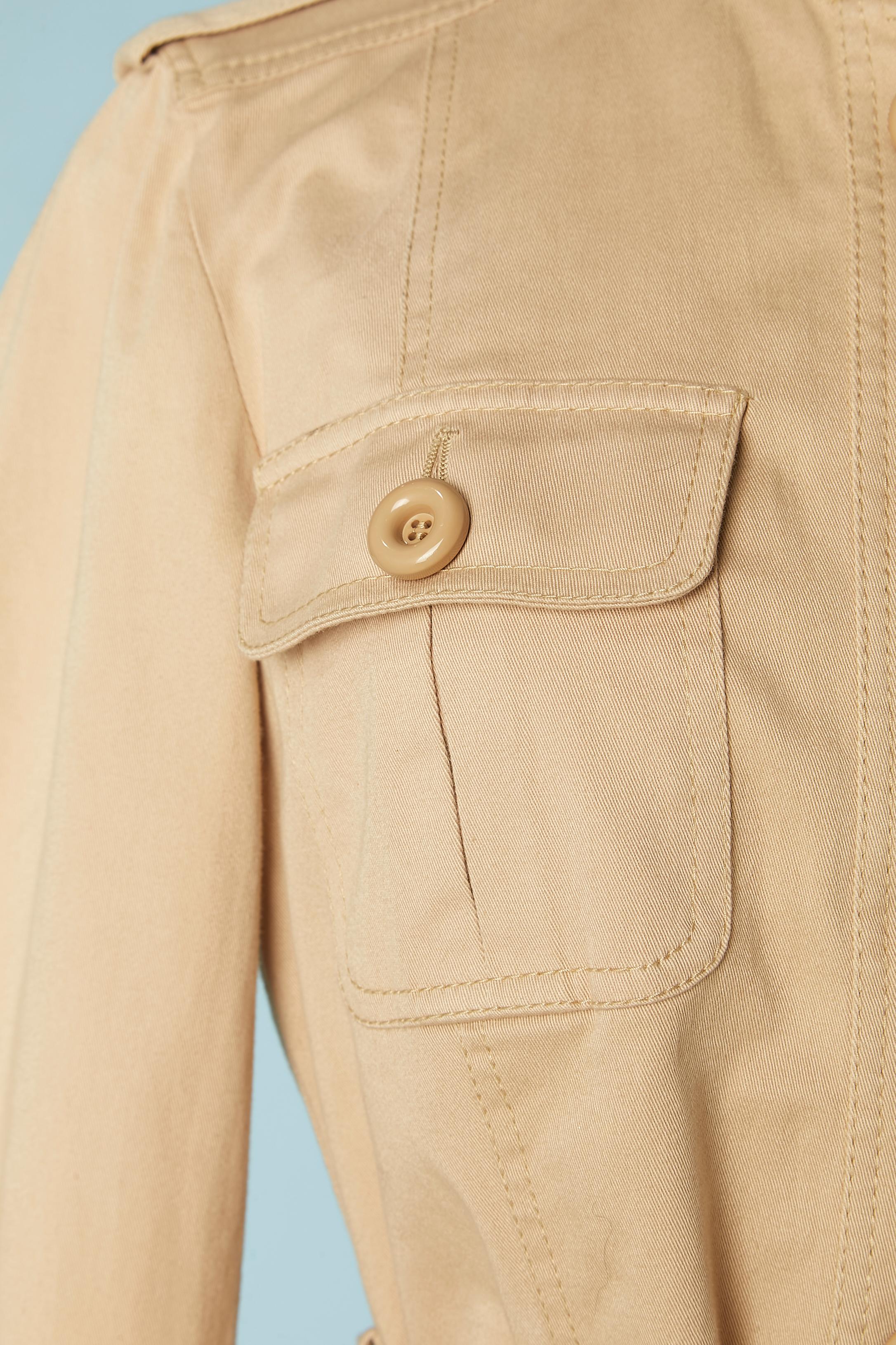 Beige cotton safari jacket with pockets and belt . 
SIZE 46 (It) 42 (Fr) nut fit more likely M 