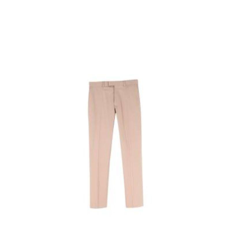 Louis Vuitton Beige Cotton Tailored Chino Trousers
 

 - Tailored, lightweight cotton chinos in a warm stone-beige 
 - Tab fastening
 - Belt loops, inset side pockets
 - Waist adjusters with silver-tone metal LV buckles 
 - Tapered leg with crease
