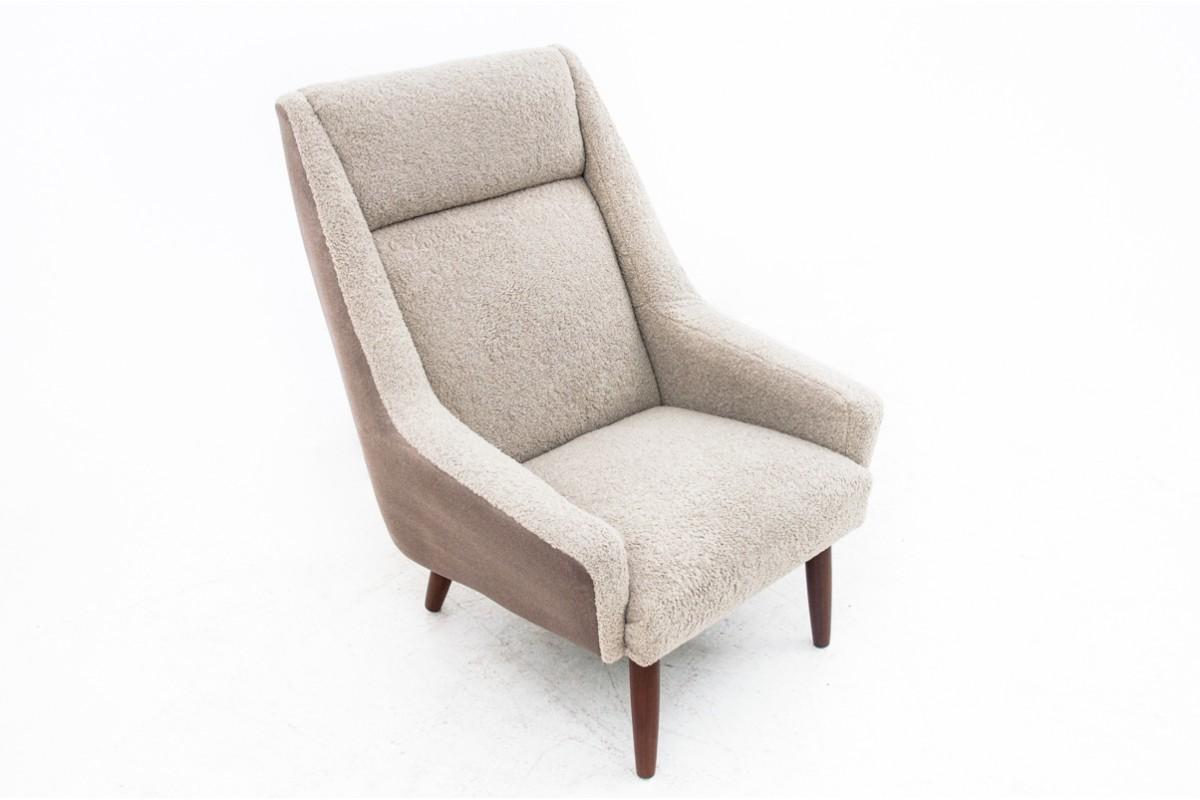 Vintage armchair, produced in Denmark in around 1960s. 
Restored, material changed for beige boucle.
Very good condition, ready to be put into interior.
Leg's wood : teak
Dimensions: Height 96 cm / seat height 37 cm / width 76 cm / depth 85