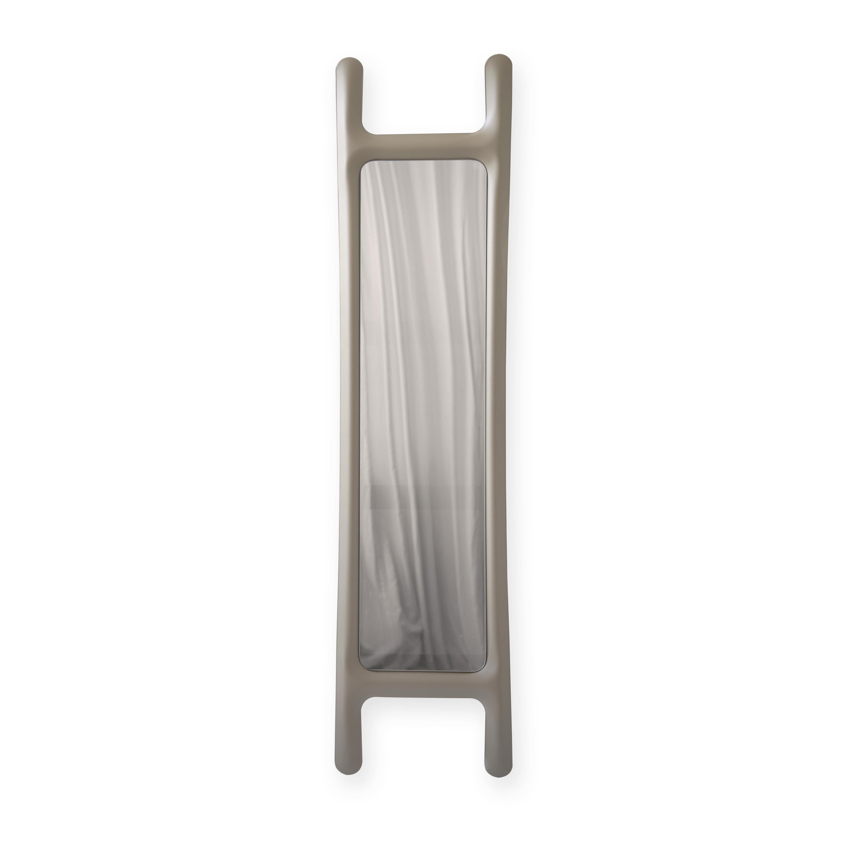 Beige drab sculptural wall mirror by Zieta
Dimensions: D 6 x W 46 x H 188 cm 
Material: Mirror, carbon steel. 
Finish: Powder-coated in beige grey matt.
Also available in colors: stainless steel, or powder-coated. 


A DRAB mirror is an