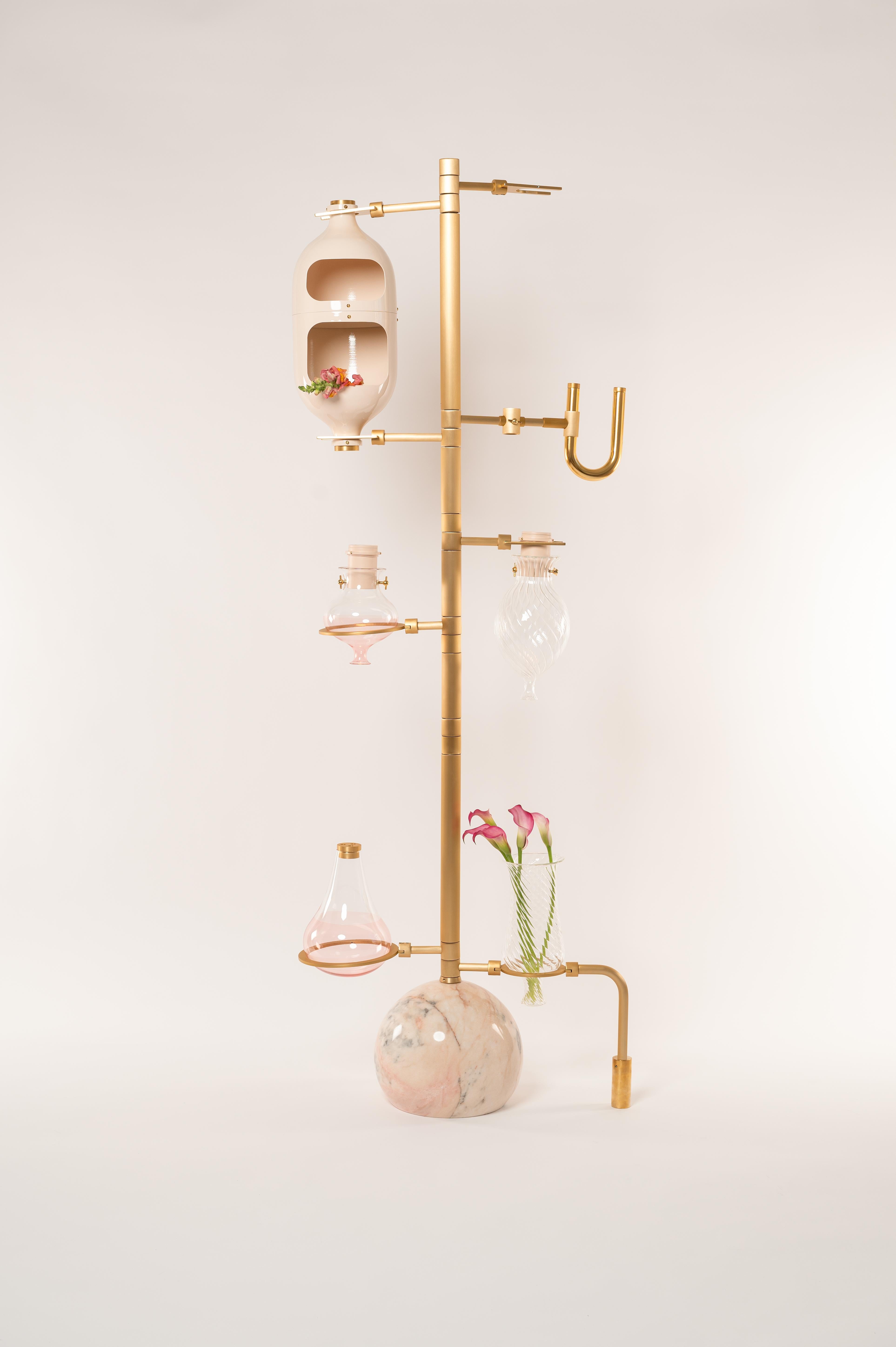 Beige Emotional Lab Floor Lamp by Hania Jneid
Dimensions: W 100 x D 100 x H 190 cm
Materials: Anodised Aluminum, screws and components in brass or Rosa Portugal Marble.

The Emotional Lab is a multifunctional sculptural art piece, that encompass-es