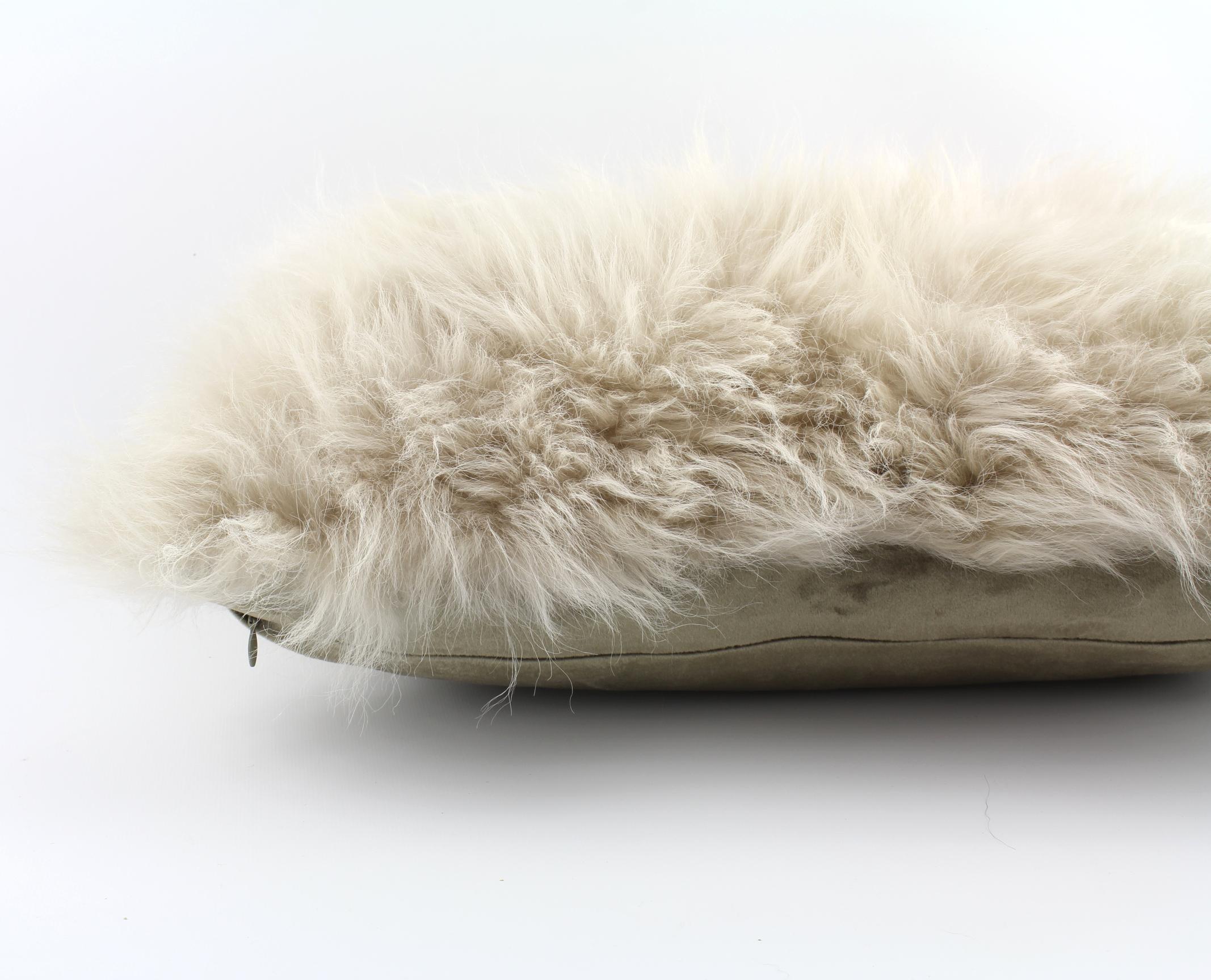 Add opulent and designer styling to a bed or sofa with this luxurious beige fur pillow made from genuine cashmere fur. With only a few pillows made this Classic will be an heirloom accent that will be enjoyed for many years to come. The rectangle