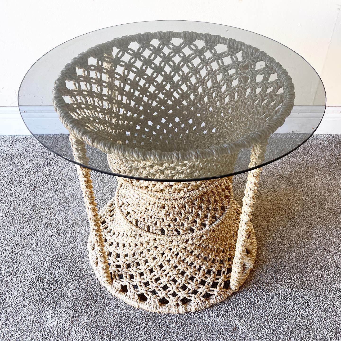 Amazing hand woven macrame side table. Features a tan/beige fabric and smoked glass.

Additional Information:
Material: Fabric
Color: Beige, Tan
Style: Mid-Century Modern
Time Period: 1960s
Place of origin: USA
Dimension: 24ʺ W × 24ʺ D × 20.5ʺ H