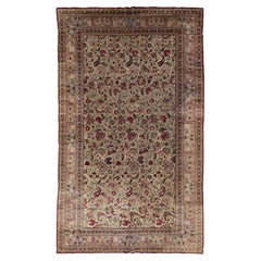 Beige Handmade Antique Persian Mashad Wool Rug With Allover Floral Design
