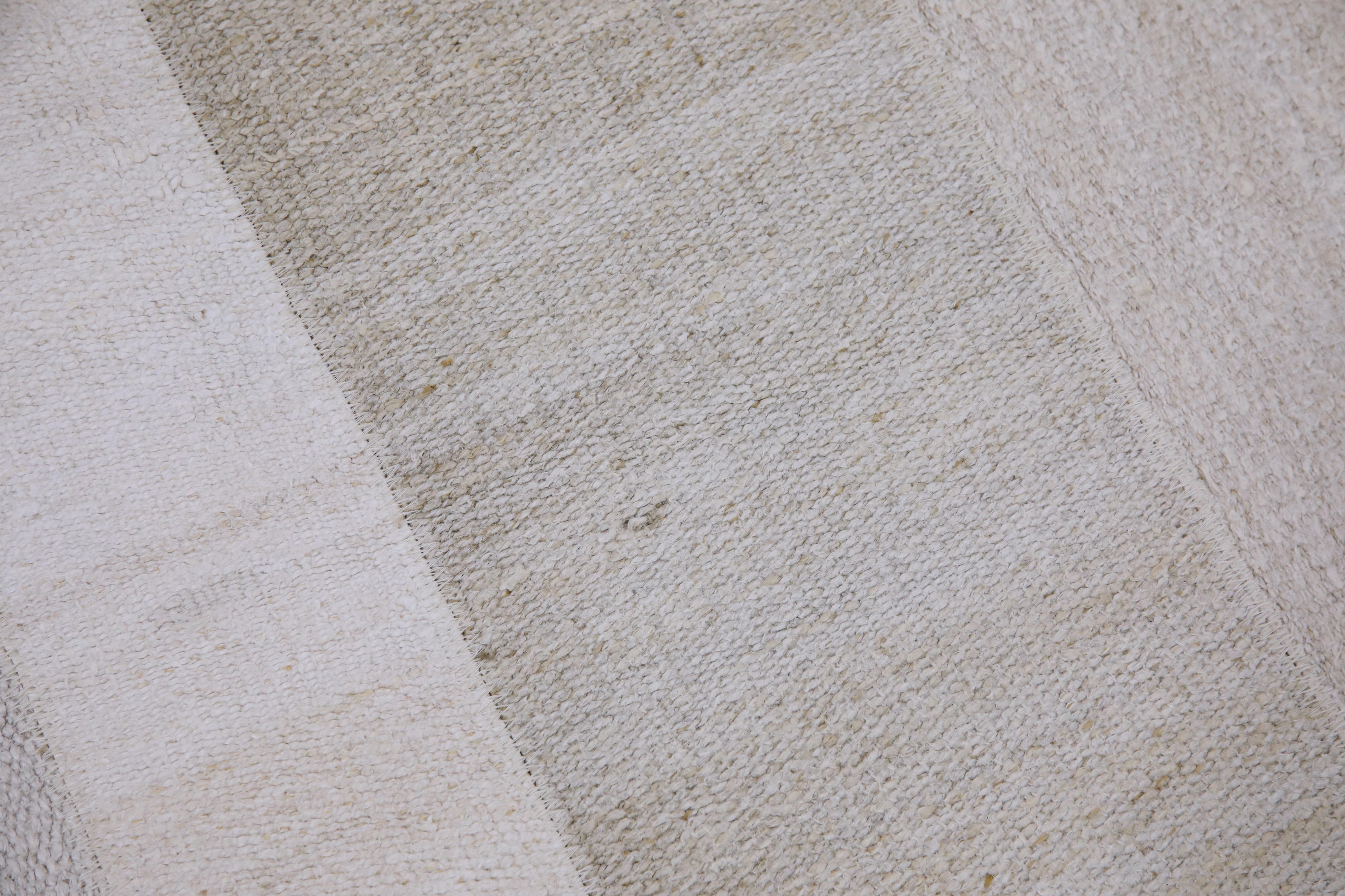 Introducing our exquisite beige handmade patchwork hemp rug, a true masterpiece of craftsmanship! This rug is made from high-quality, organic, and eco-friendly hemp, which is sustainably sourced and carefully handcrafted by skilled