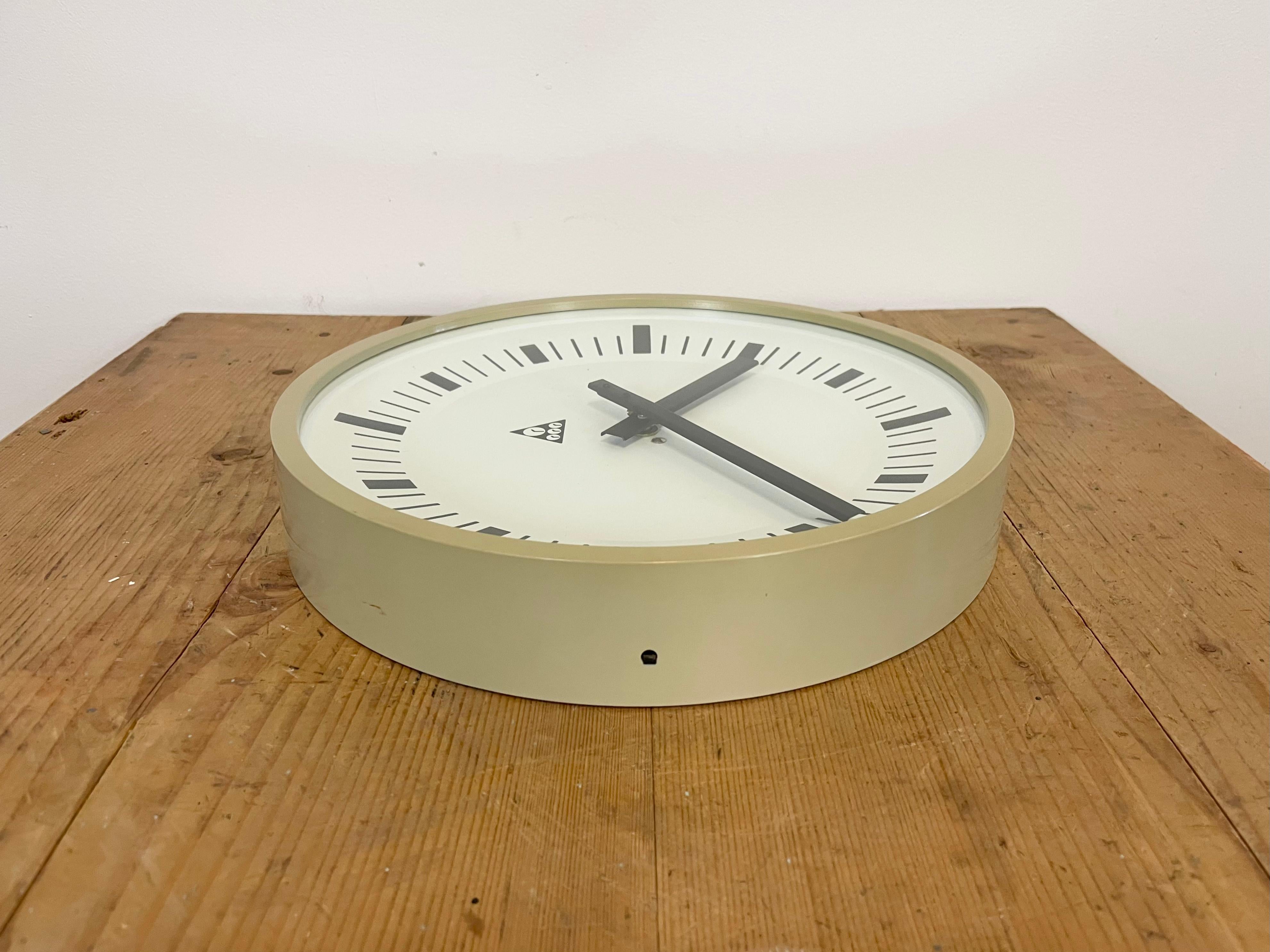 Aluminum Beige Industrial Bakelite Wall Clock From Pragotron, 1970s For Sale