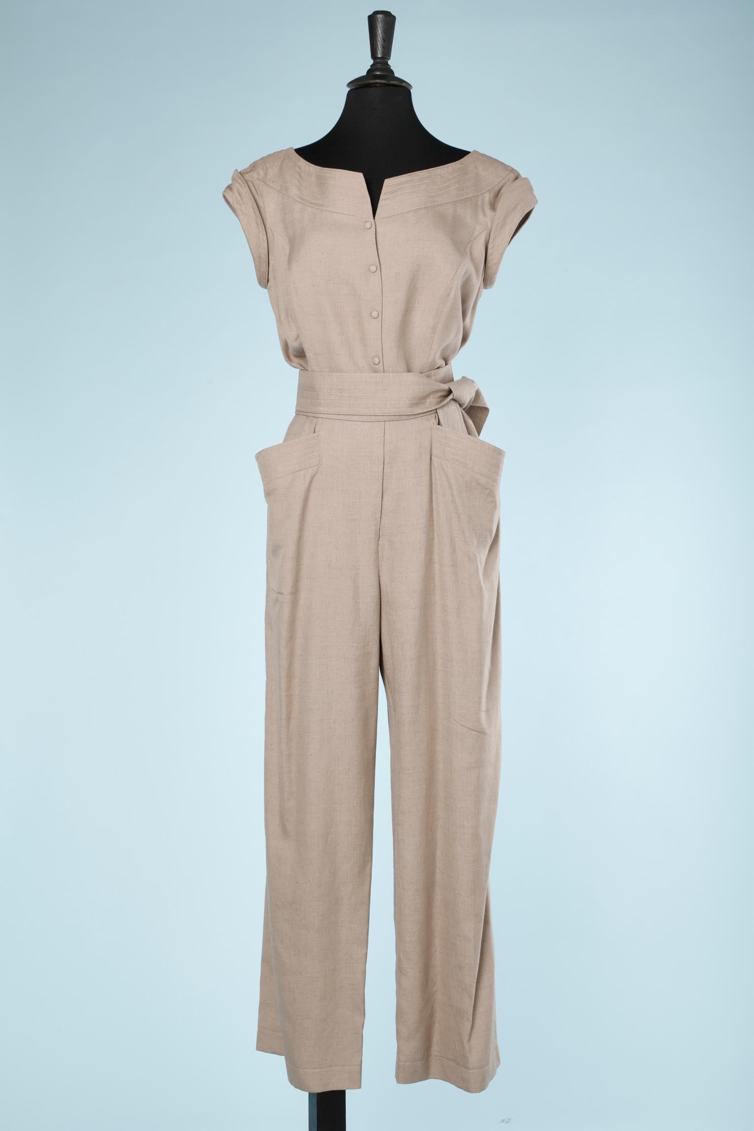 Beige jumpsuit with belt, button and pockets in rayon