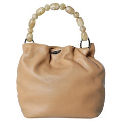 Beige leather bag with handle in resin beads Christian Dior Numbered 