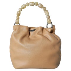 Beige Ledertasche mit Henkel aus Harzperlen von Christian Dior, nummeriert