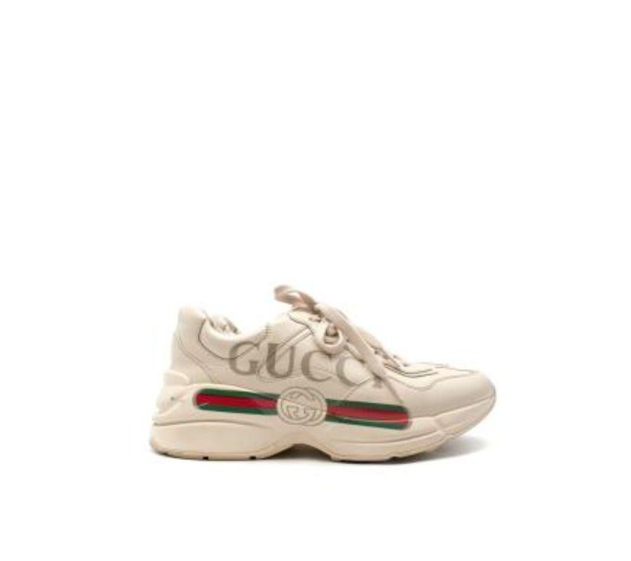 Gucci Beige Rhyton Sneakers
 
 - Lace-up sneakers with a chunky rubber sole
 - Vintage logo across the side
 - Beige leather interior 
 
 Materials 
 Leather 
 
 Made In Italy 
 
 9 very good condition, some signs of wear to the outsole
 
 PLEASE