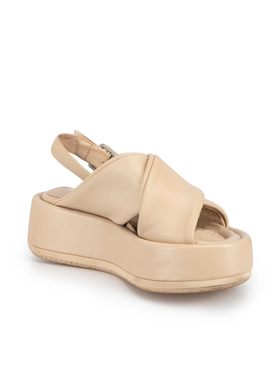CONDITION is Very good. Minimal wear to shoes is evident. Minimal wear to both platforms with small scuffs and scratch marks on this used Paloma Barceló designer resale item.



Details


Beige

Leather

Flatform sandals

Adjustable slingback