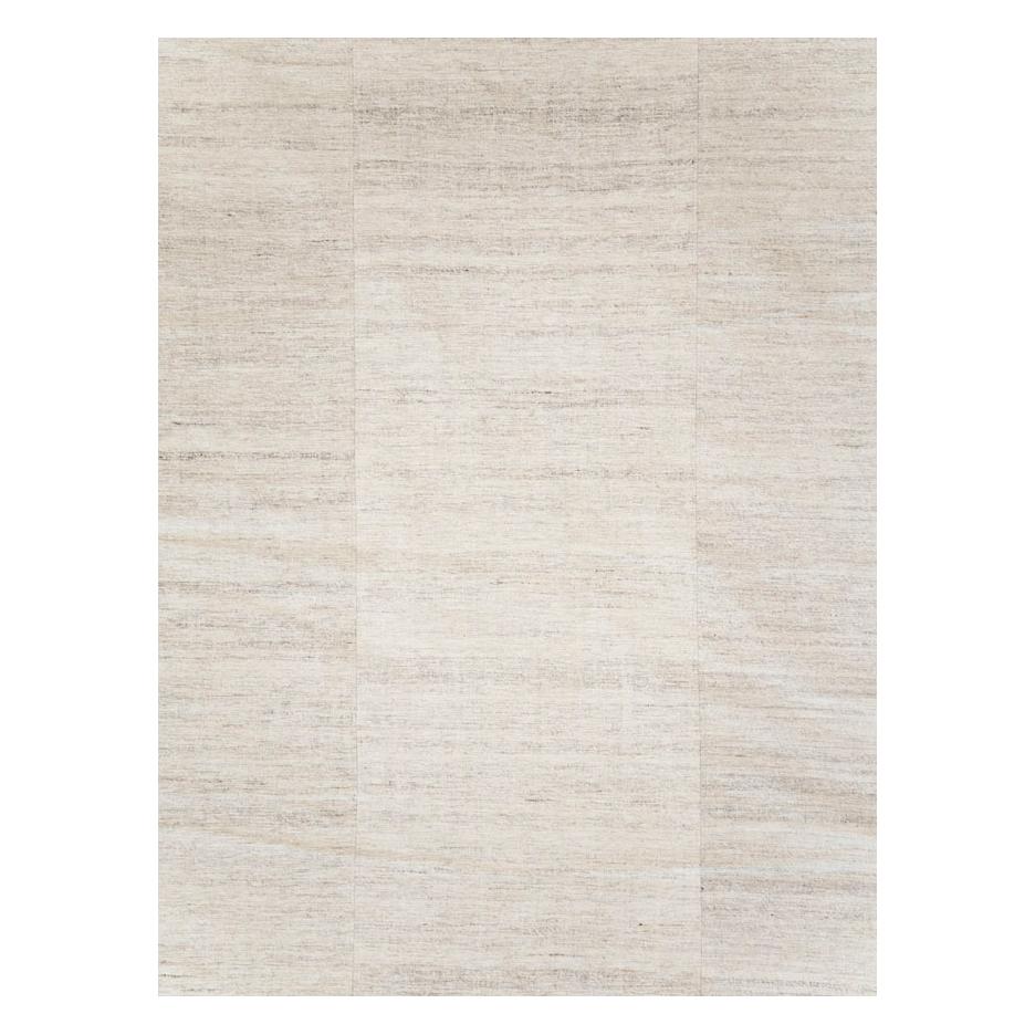 A vintage Turkish flatweave Kilim room size carpet handmade during the mid-20th century with a minimalistic and monochromatic design in beige.

Measures: 9' 0