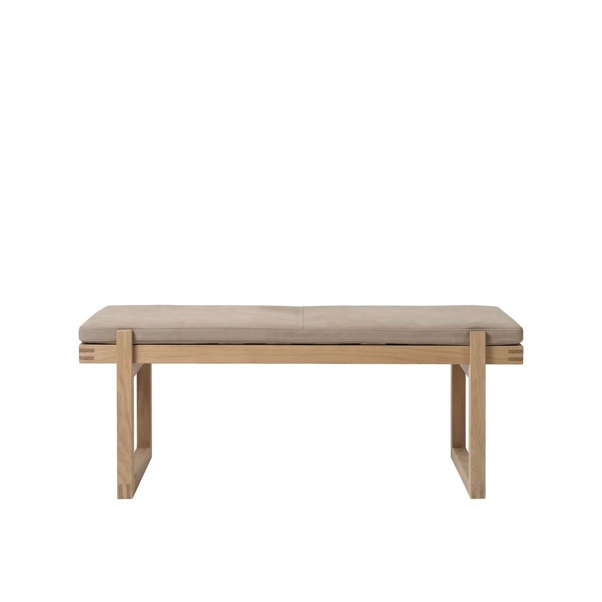 Beige minimal bench by Kristina Dam Studio
Materials: Solid oak with oil treatment, beige textile.
Also available in other colors.
Dimensions: 40 x 115 x H 44cm.

The bench frame is made of solid oak and the soft foam mattress is available in