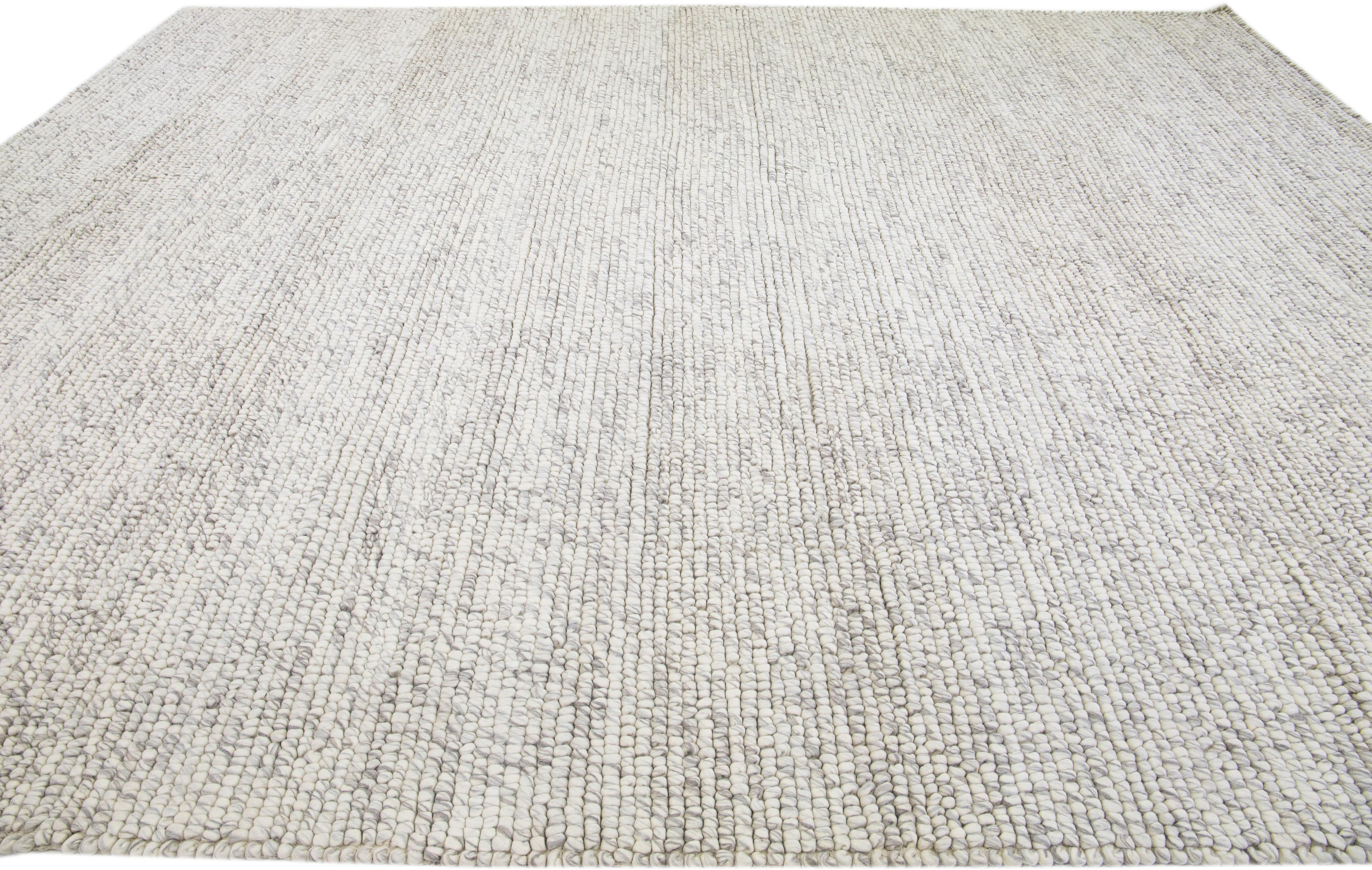 Indian Beige Modern Felted Textuted Wool Rug By Apadana For Sale