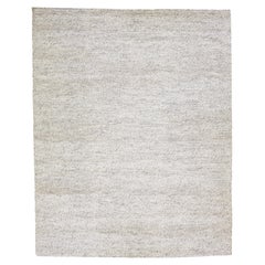 Tapis moderne en laine texturée feutrée beige d'Apadana