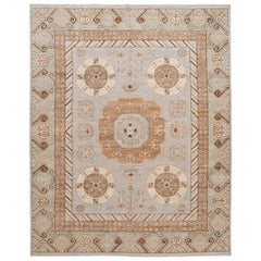 Tapis en laine beige moderne de style Khotan fait à la main