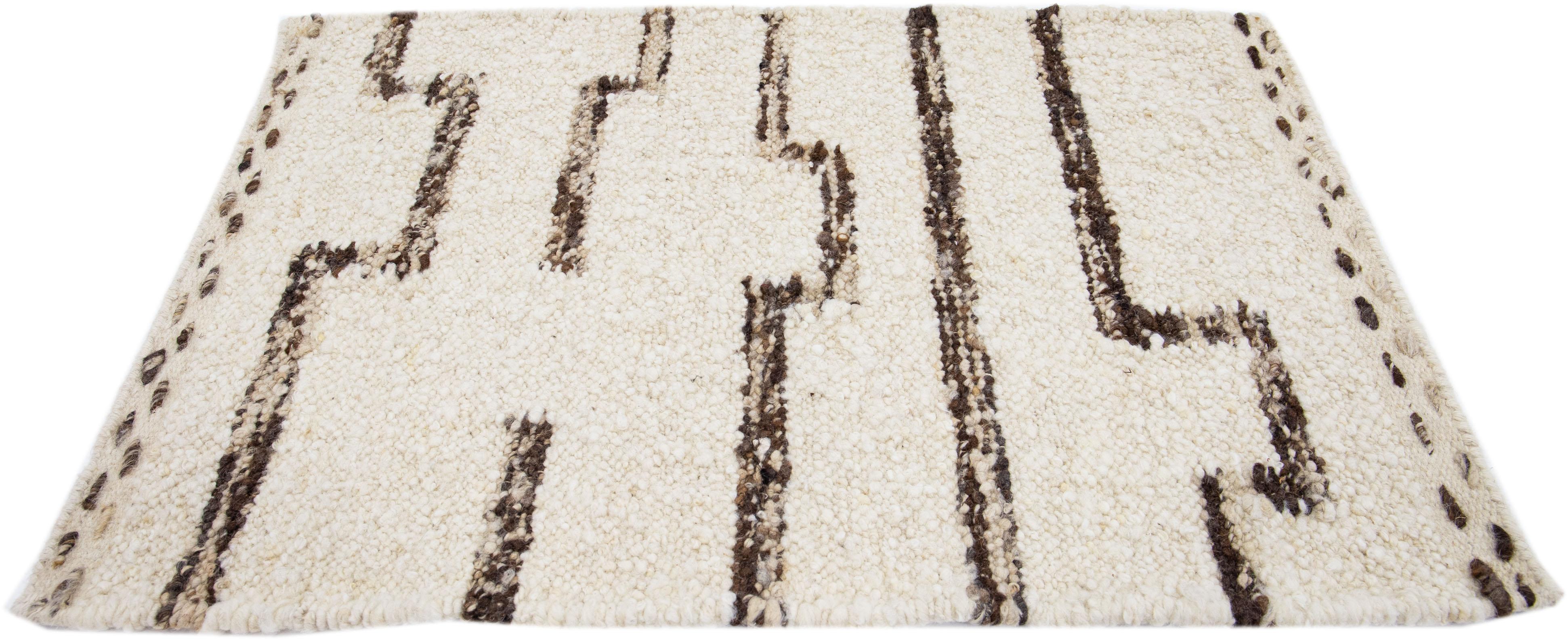 Apadana's Modern Moroccan Style wool custom rug. Custom sizes and colors made-to-order.

Material: 80 Wool and 20 Cotton.
Techniques: Hand-Woven-Durry.
Style: Moroccan.
Lead time: Approx. 15-16 weeks available.
Colors: As shown, other custom colors