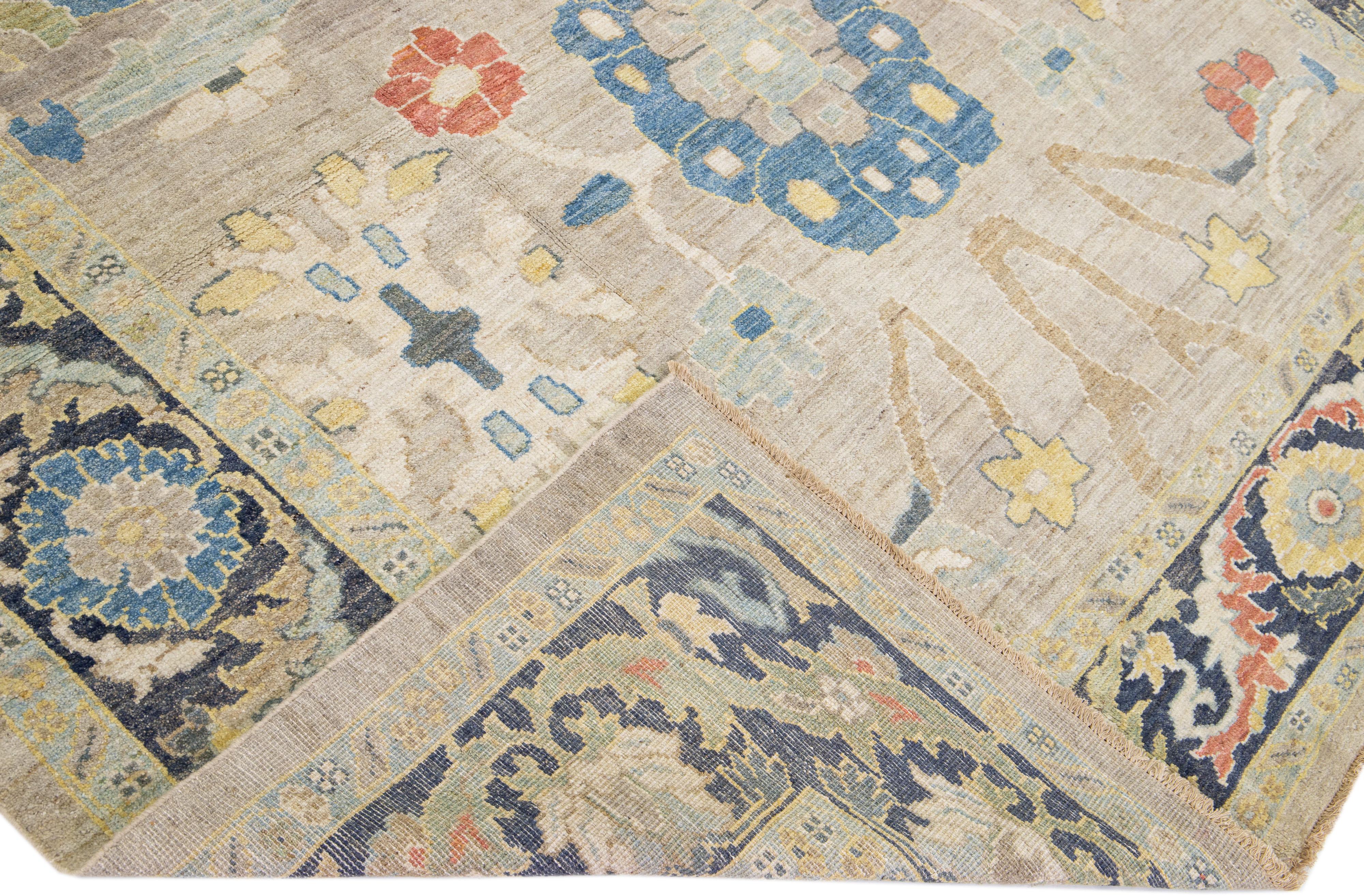 Beautiful modern Sultanabad hand-knotted wool rug with a beige color field. This rug has a gray frame and multicolor accents in a gorgeous all-over floral design.

This rug measures: 8'7