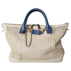 Beige perforated leather bag with blue leather handle and bottom Chloé 