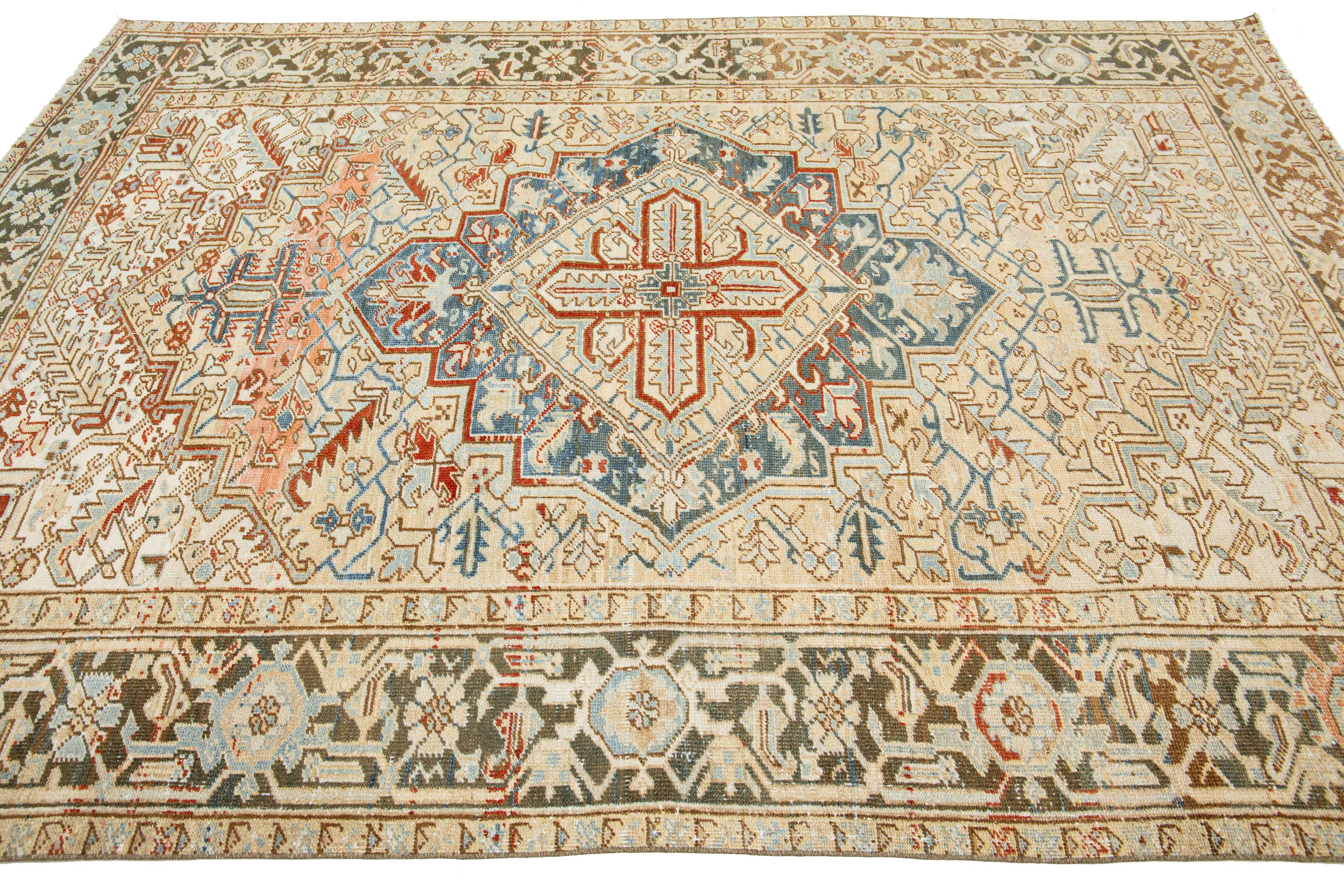 Hand-Knotted Beige Persian Heriz Antique Wool Rug Featuring a Medallion Motif From The 1920s For Sale