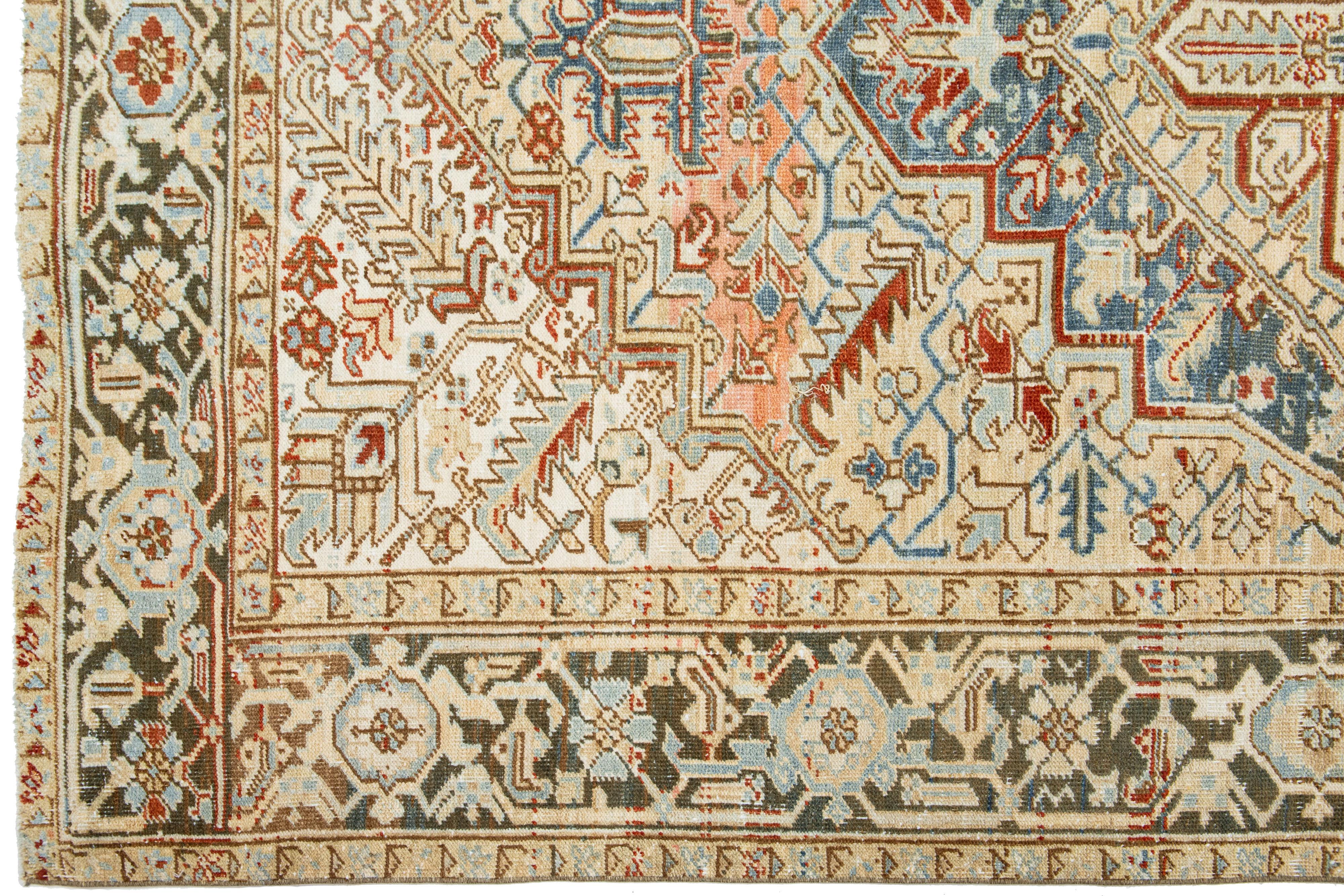 Early 20th Century Beige Persian Heriz Antique Wool Rug Featuring a Medallion Motif From The 1920s For Sale