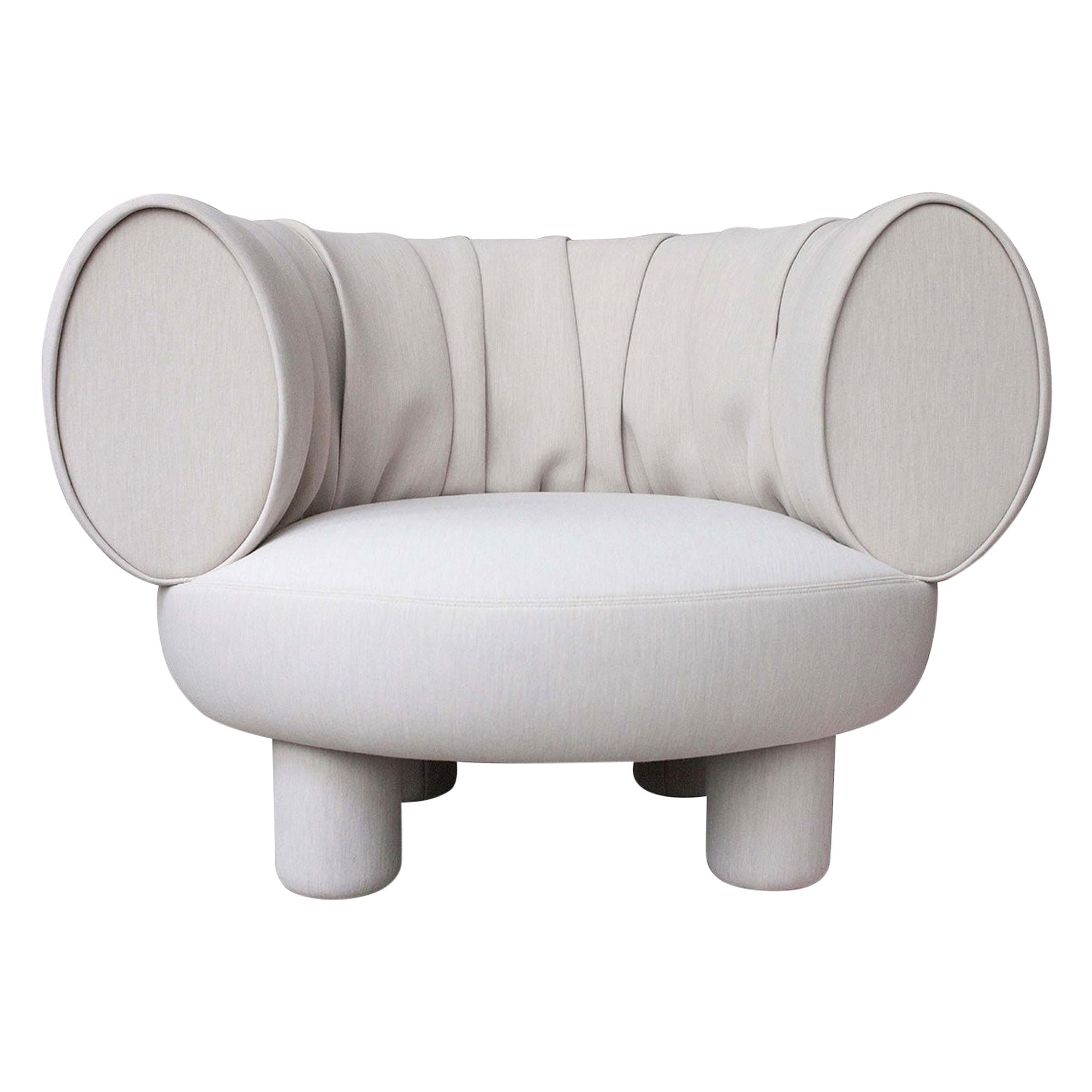 Canapé beige conçu par Thomas Dariel