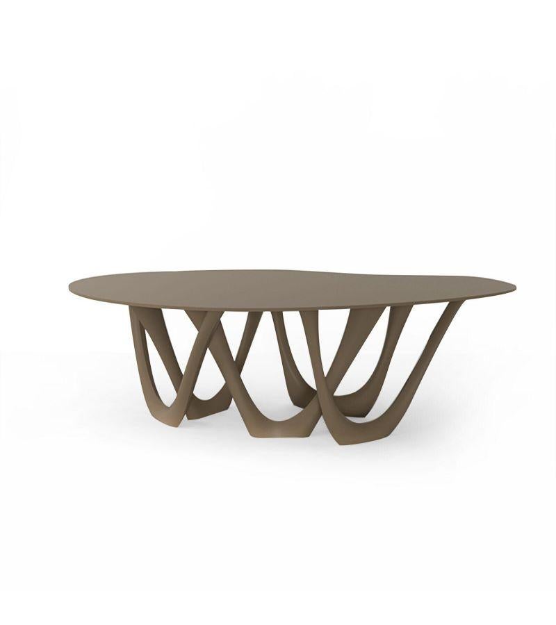 Beige steel G-table by Zieta
Dimensions: D 110 x W 220 x H 75 cm 
Material: Carbon steel. 
Finish: Powder-coated.
Available in colors: Beige, black/brown, black glossy, blue-grey, concrete grey, graphite, gray beige, gray-blue, moss grey, olive