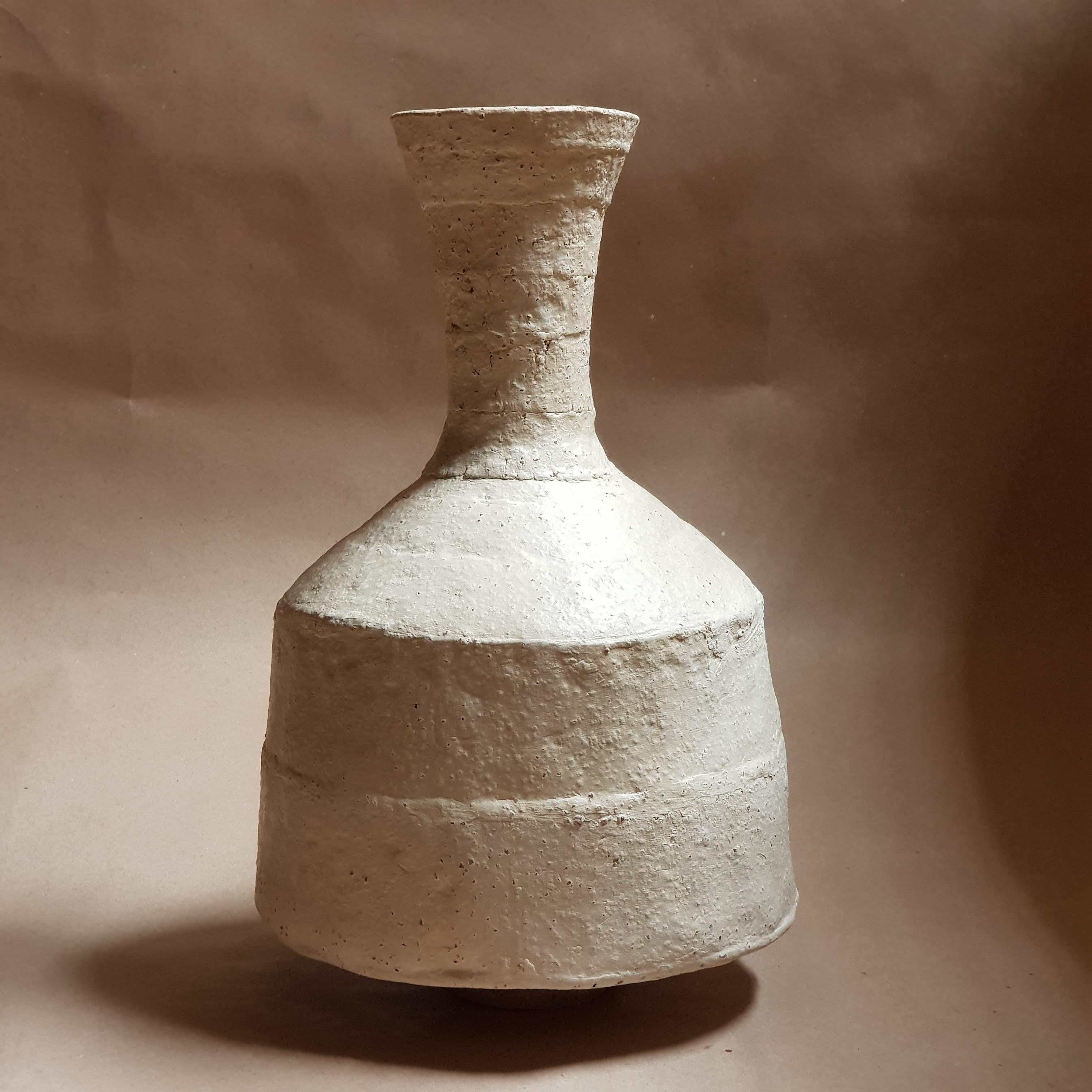 Beige Stoneware Lekythos Vase by Elena Vasilantonaki
Unique
Dimensions: ⌀ 17 x H 26 cm (Dimensions may vary)
Materials: Stoneware
Available finishes: Black, Beige , Brown, Red, Terracotta, White Patina

Growing up in Greece I was surrounded by