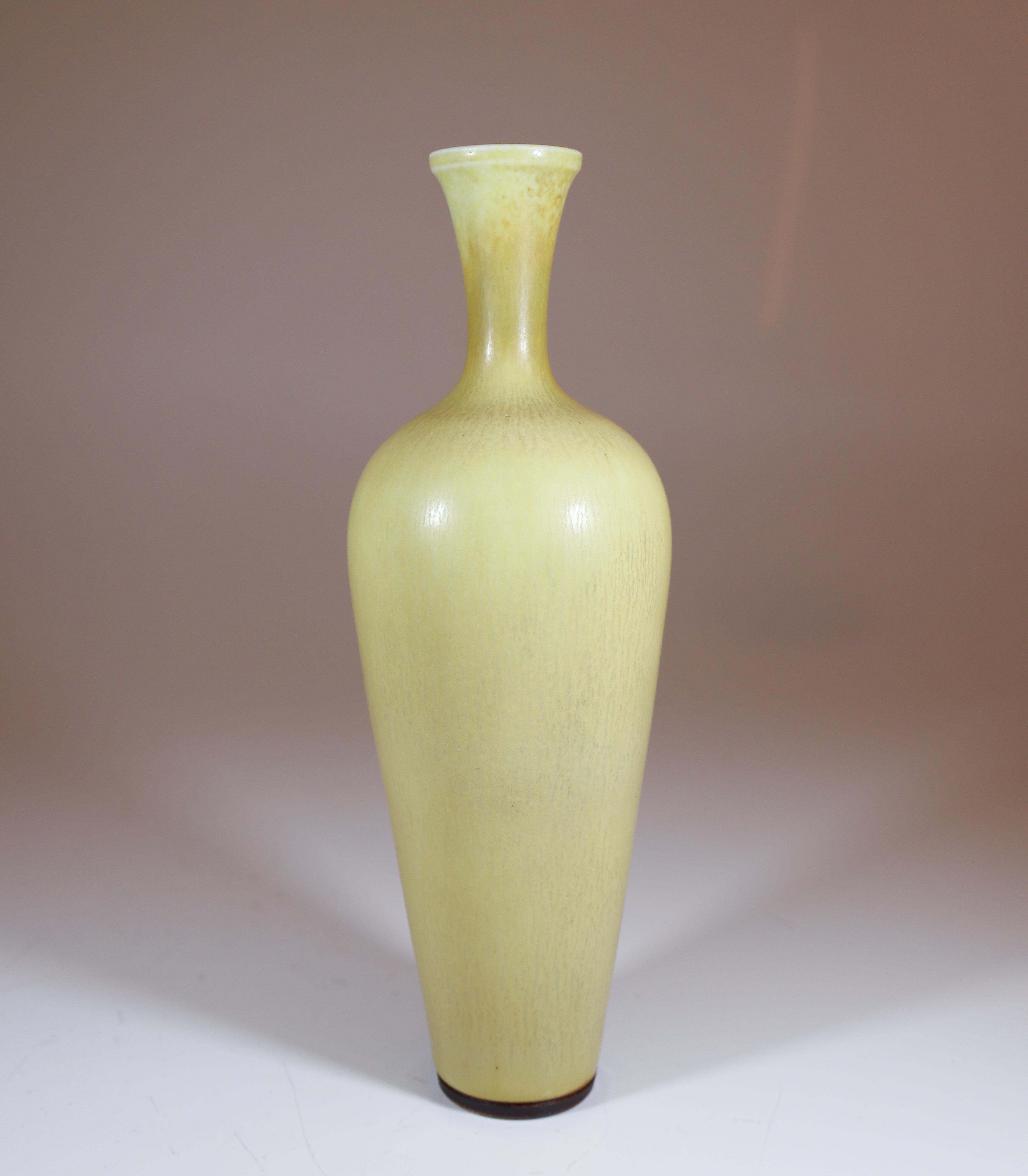A beige stoneware vase designed by Berndt Friberg from Gustavsberg. The vase is 17.5 cm. It's in very good condition.