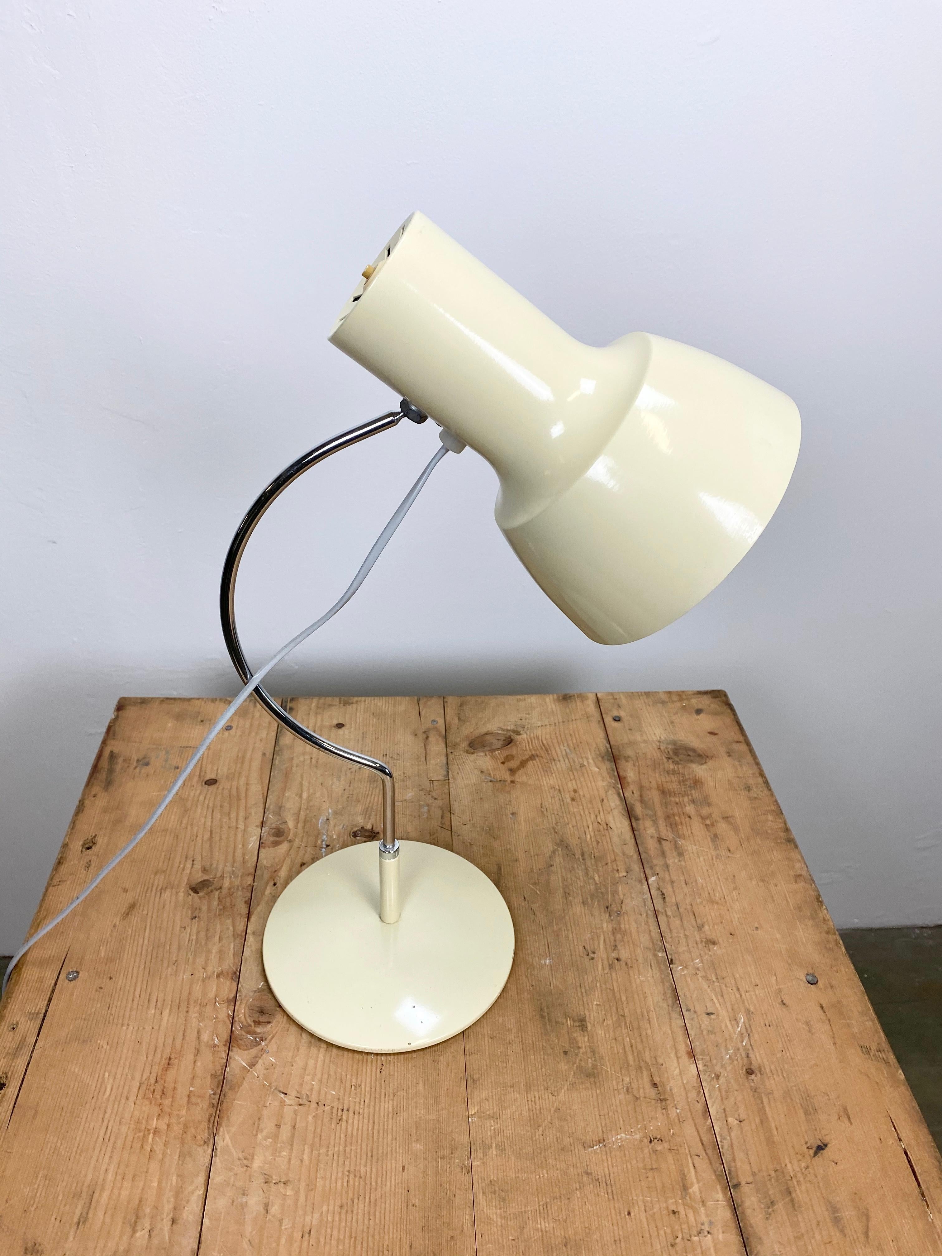 This table lamp, model 1633, was designed by Josef Hurka and produced by Napako in former Czechoslovakia during the 1960s. The lamp has a steel body and an aluminium lampshade. The switch is situated directly on the shade.Good vintage
