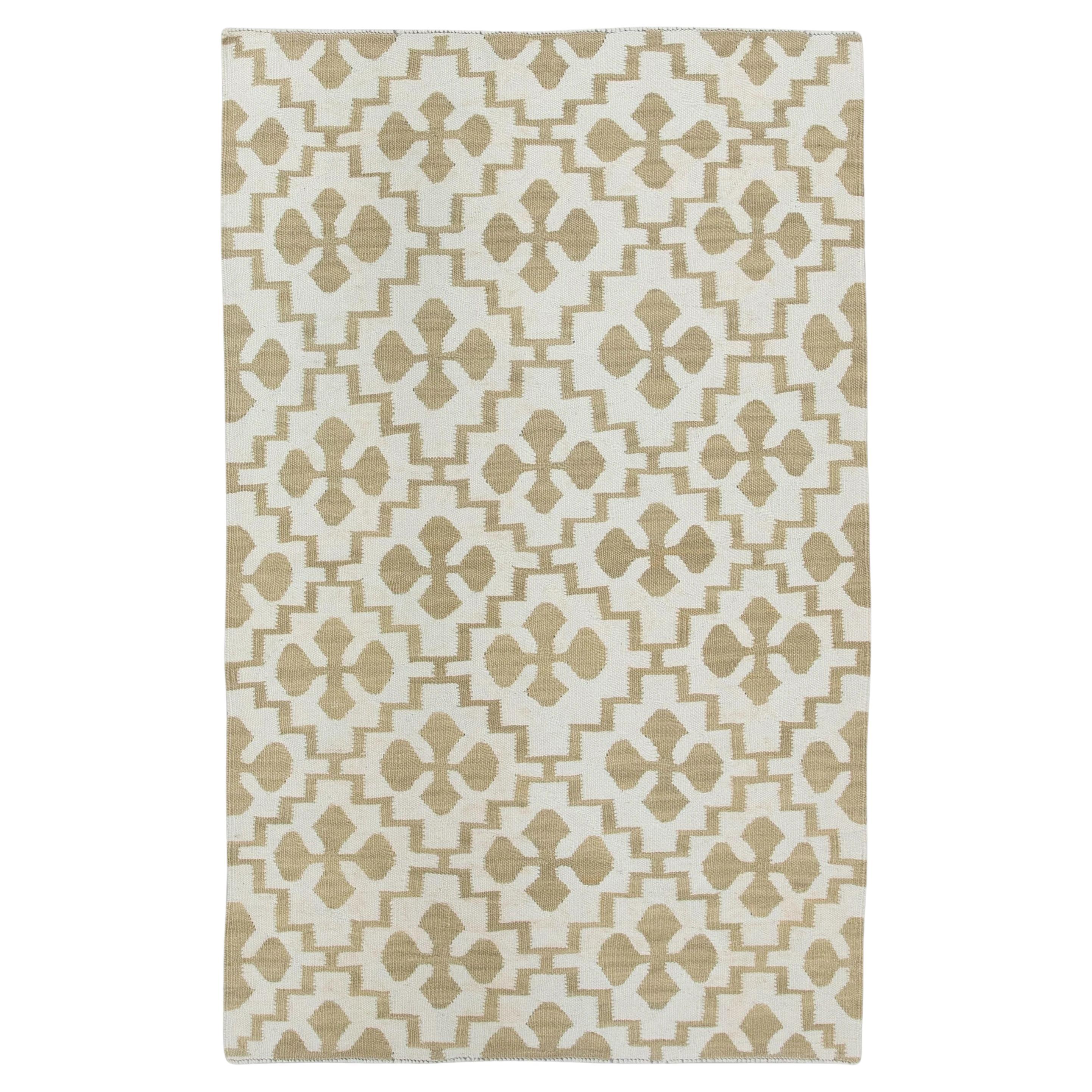 Alfombra de lana de tejido plano beige y tostado 3' x 4'9 en venta
