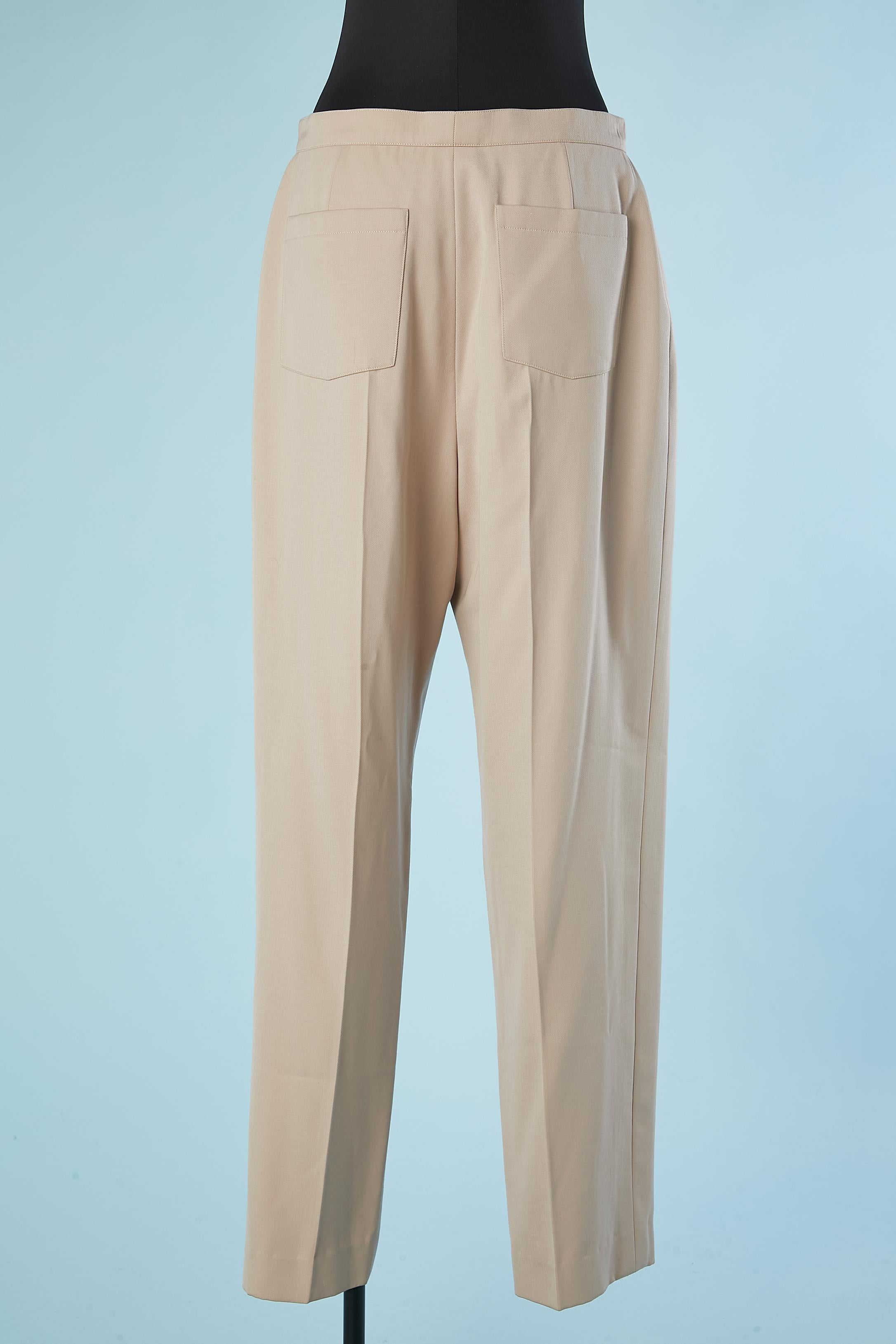 Beige thin wool trouser with branded buttons CHANEL  For Sale 1