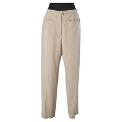 Beige thin wool trouser with branded buttons CHANEL 