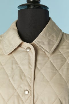 Beige top-stitched and lightly padded jacket with Tartan lining Burberry London