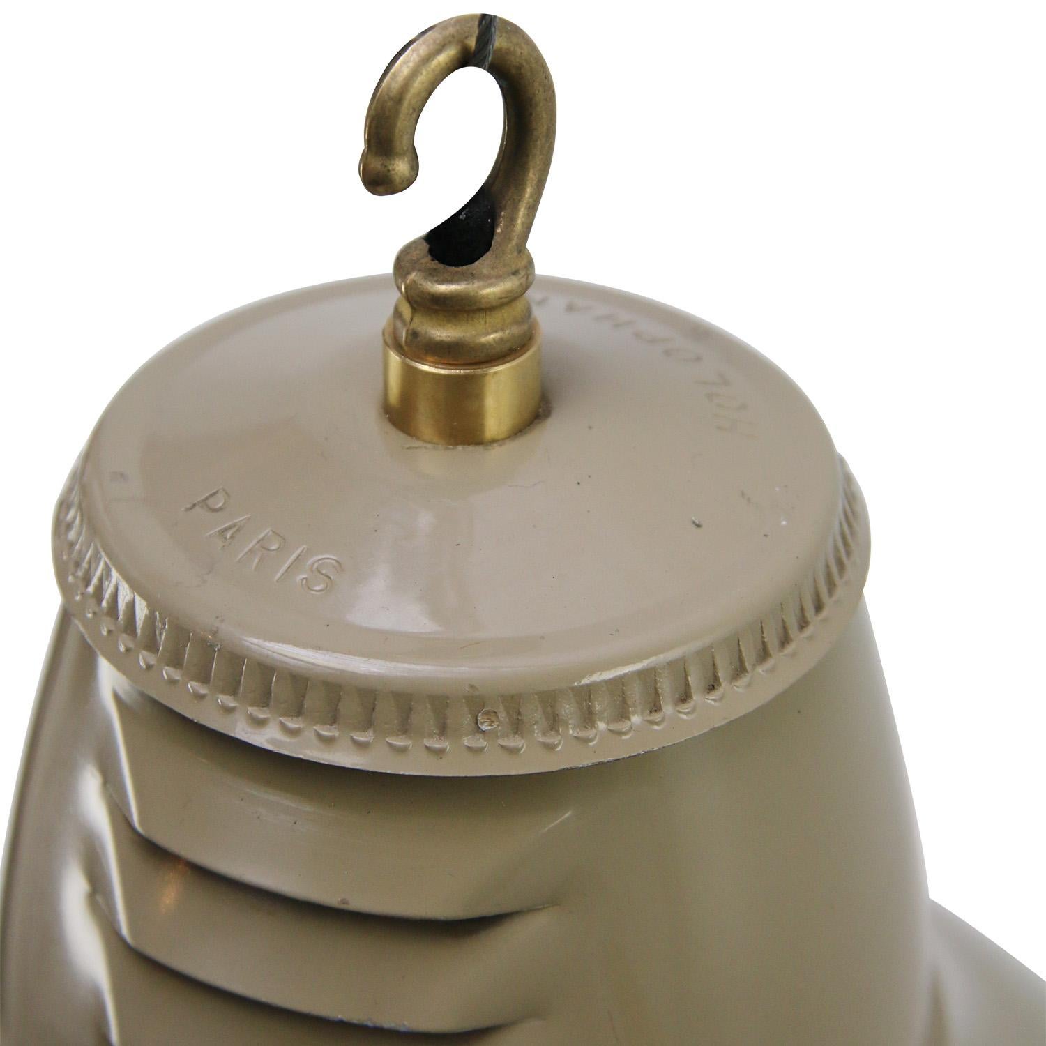 Industrial pendant lamp by Holophane Paris
Beige metal shade with clear striped / holophane glass
Brass top

Weight 2.20 kg / 4.9 lb

Priced per individual item. All lamps have been made suitable by international standards for incandescent