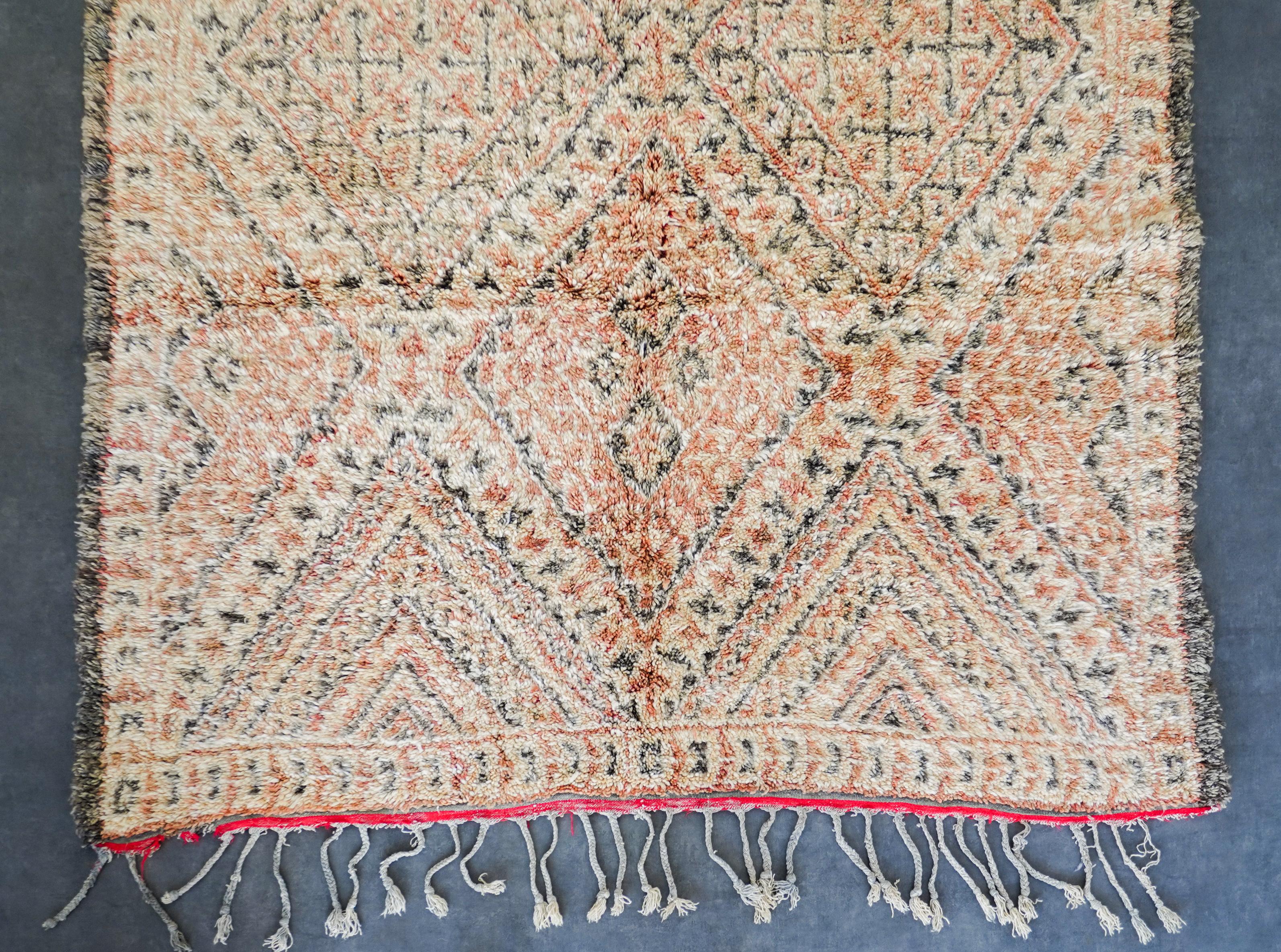 KD03 6.6x14 Ft 200x420 Cm

Uncover the rich heritage woven into our beige Moroccan vintage rug. Handmade by skilled artisans using time-tested techniques, each Berber rug is a unique narrative, echoing the cultural tapestry of Morocco. With