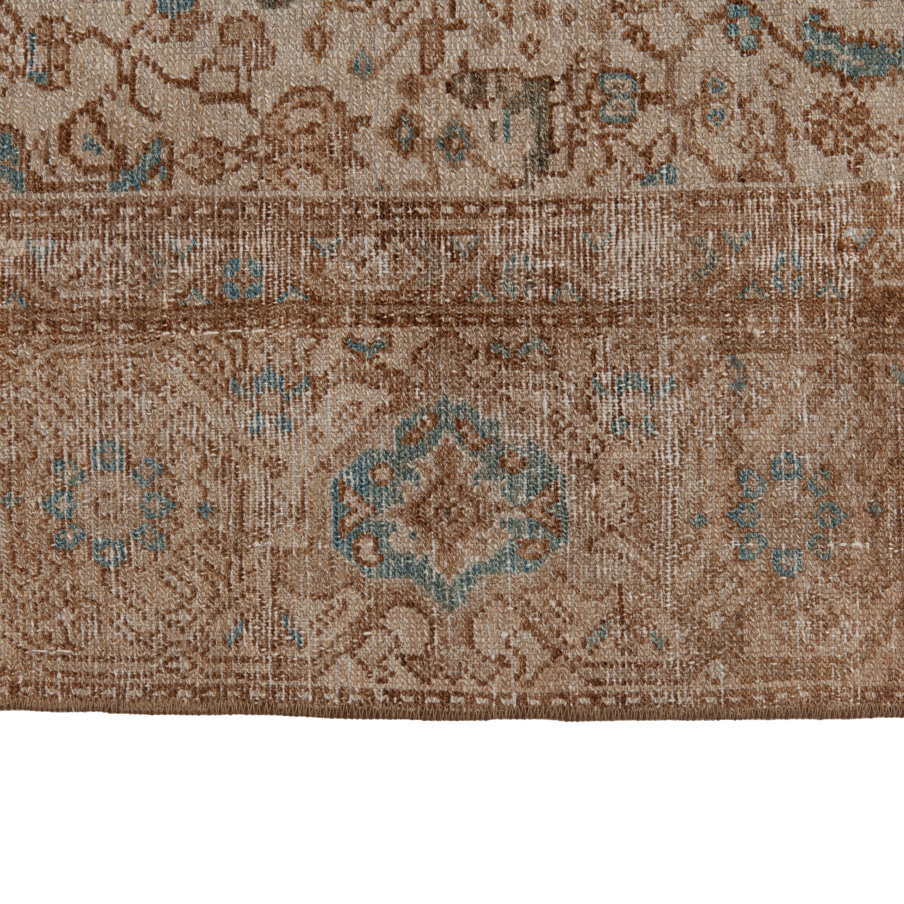 Featuring a variety of intricate traditional patterns in a neutral palette, this Anatolian Wool Rug - 4'9' x 10'1