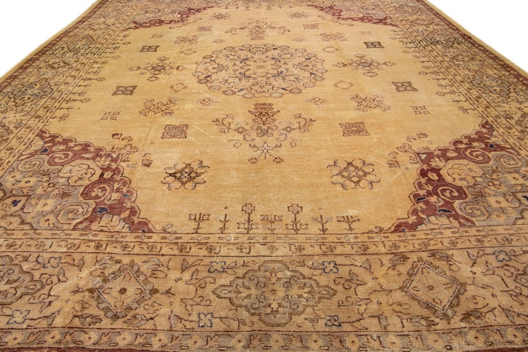 Hand-Knotted Beige Vintage Turkish Oushak Handmade Wool Rug With Rosette Motif For Sale