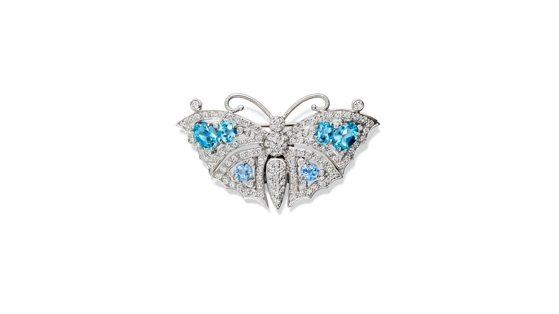 Beijing butterfly 18 carat white gold interchangeable brooch front with blue sapphires, aquamarine and diamonds. From the Journey to China.