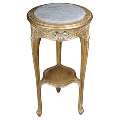 Finely carved gold side table with marble top, Louis XV