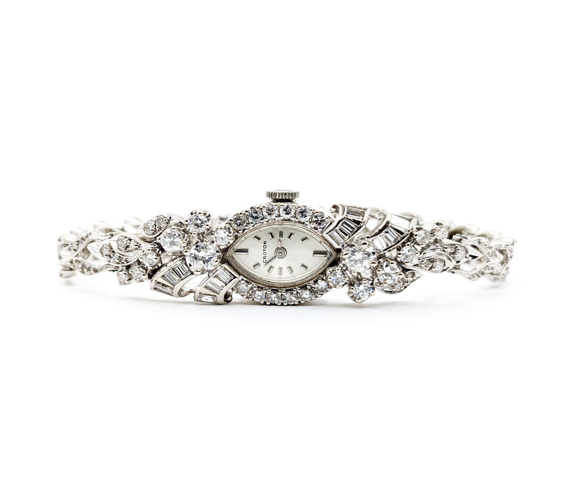 Bejeweled Vintage 3.00ctw Diamond Croton Ladies Watch

Introducing the stunning Croton vintage watch, a true testament to timeless elegance. Meticulously crafted in 14k white gold, this beautiful timepiece is adorned with a captivating array of