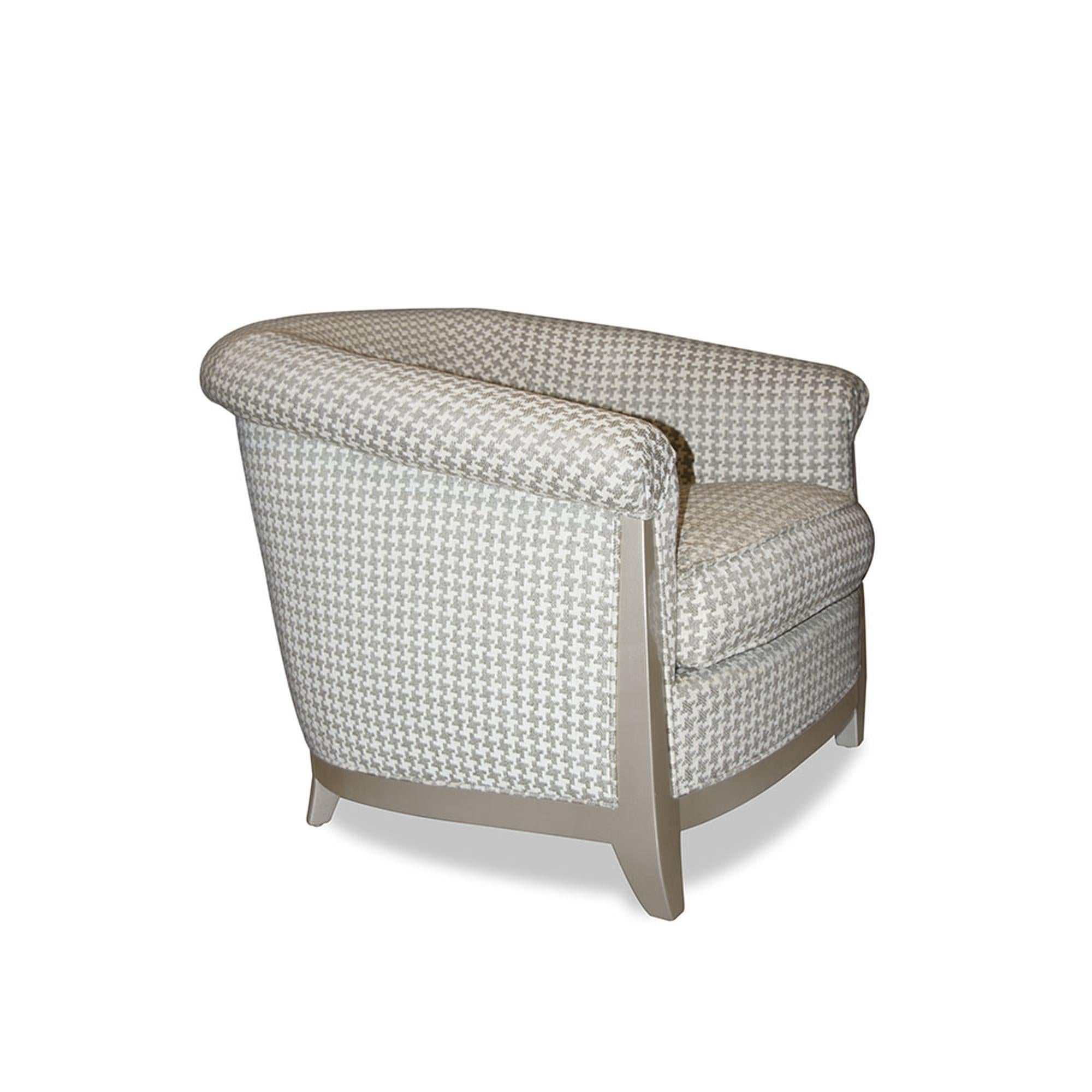 The Bel Air lounge chair II is a simply Classic piece, reminiscent of an Art Deco barrel chair. With a rich matte wood frame, this cozy chair is upholstered beautifully on all sides. The down wrapped foam cushion allows the user to sink in and relax