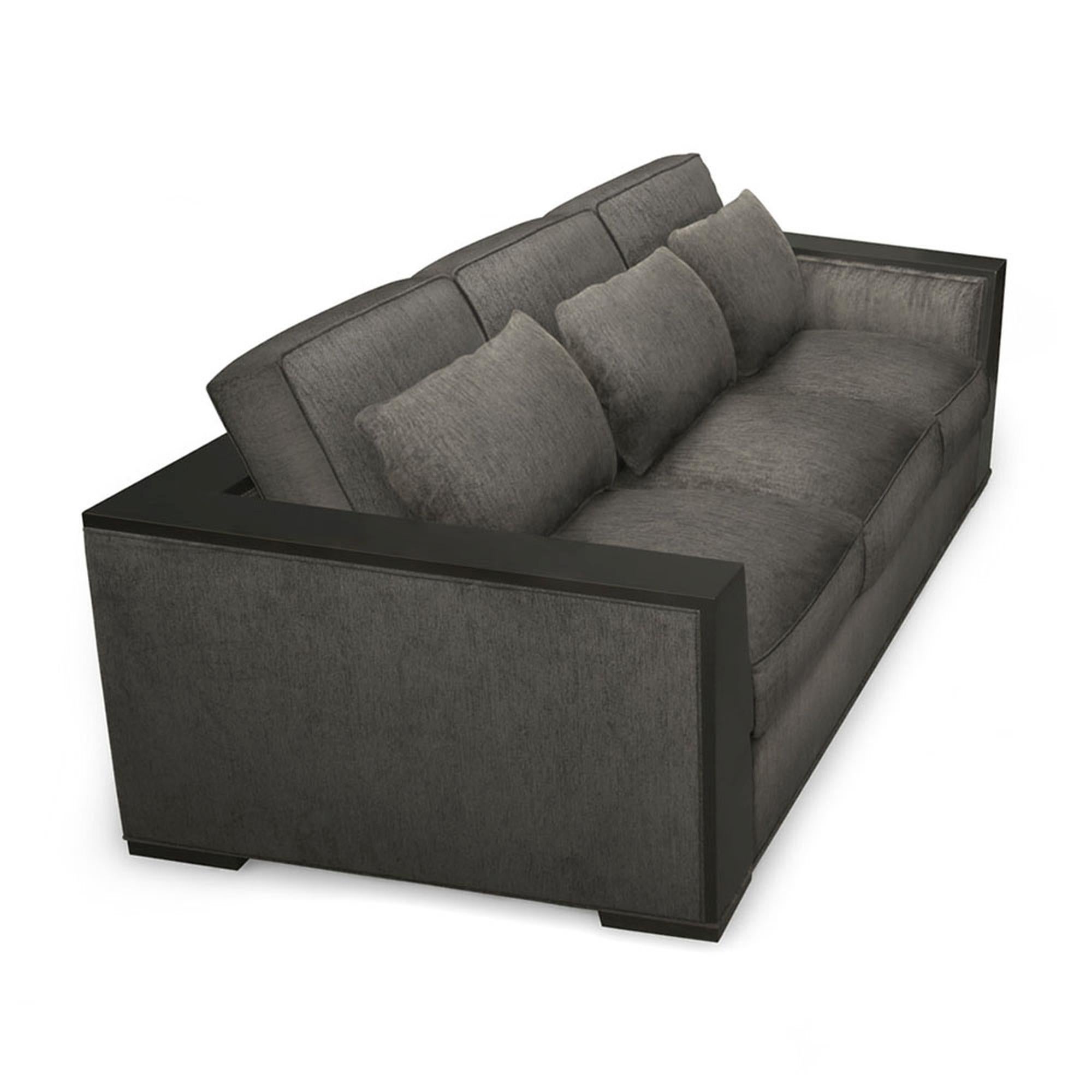 A rich and generous seat, the contemporary Bel air sofa makes a solemn and substantial contribution to any room in which it sits. With a sleek wood frame, this chair is fully upholstered on all sides, and is luxuriously deep. The down wrapped foam