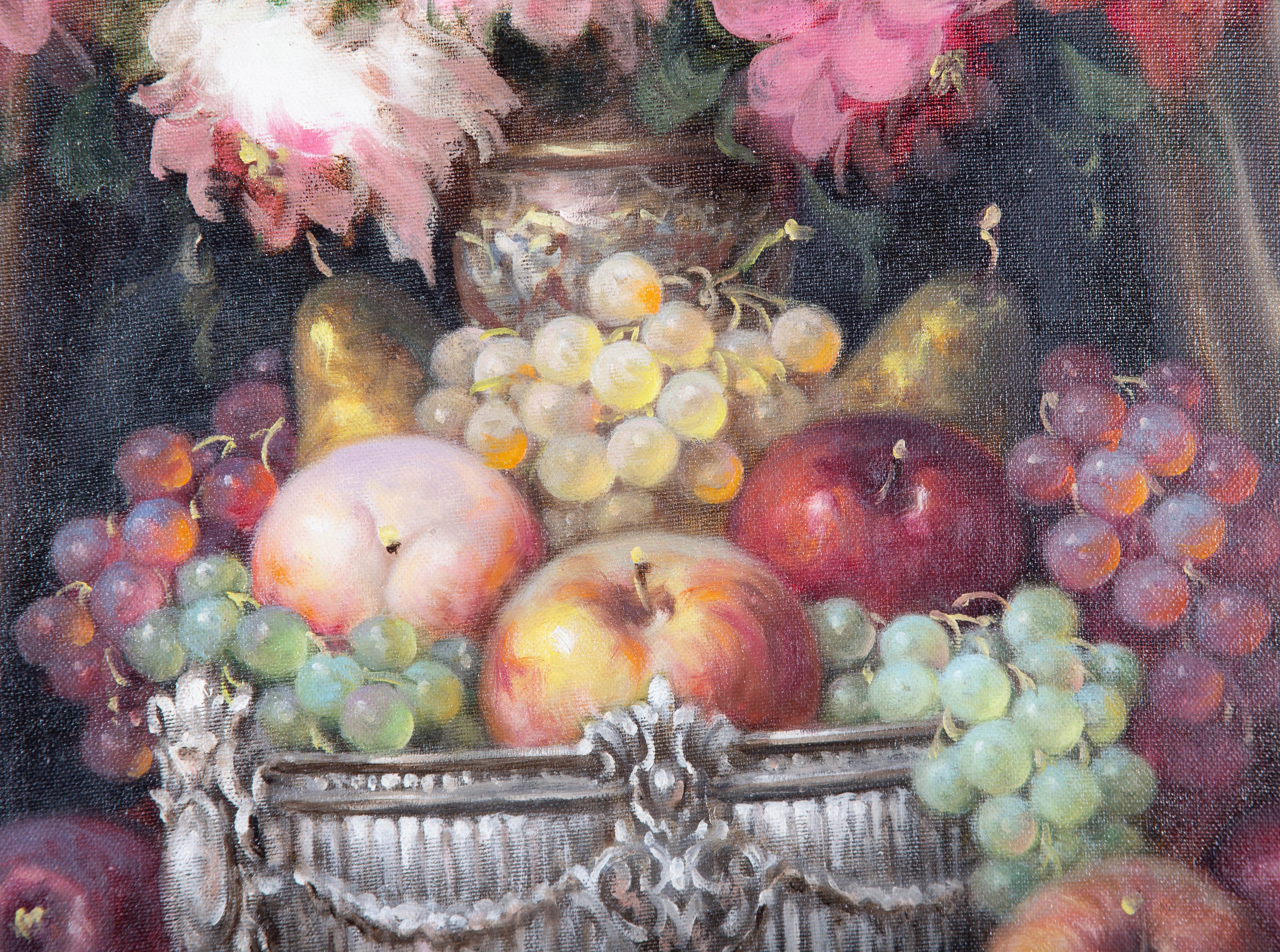 A fine and accomplished oil painting by Hungarian artist Bela Balogh, depicting a still life scene with fruit in a silver bowl, roses in a vase behind, a wine ewer and a silver goblet. Signed to the lower right-hand corner. Well-presented in an