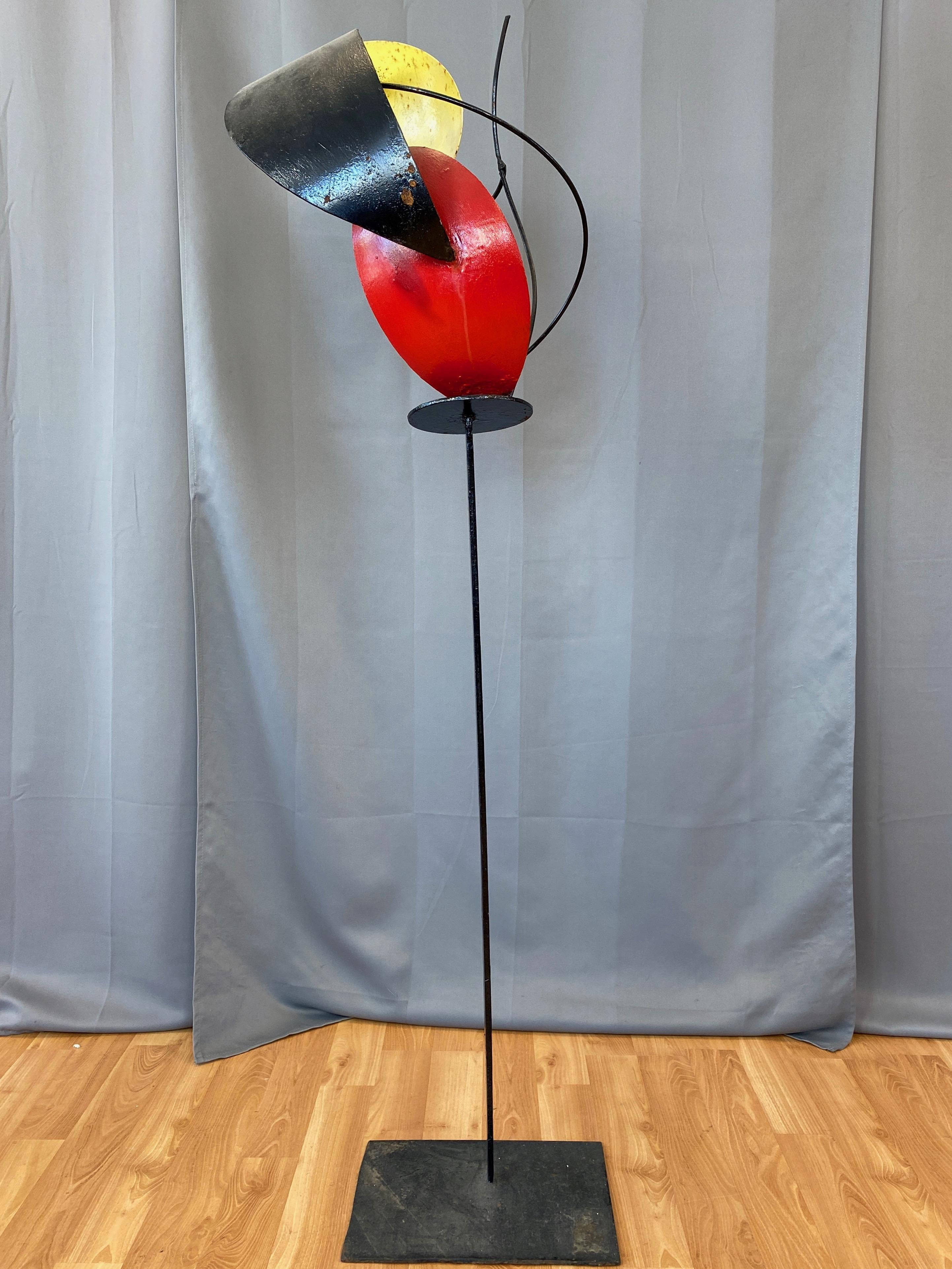 A tall abstract expressionist enameled steel sculpture by San Francisco painter and sculptor Béla Harcos from his late 1990s “Calligraphy in Steel” exhibition.

Trio of billowed sail or leaf-like forms in black, red, and yellow enameled welded