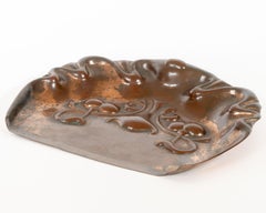 Beldray. An Arts and Crafts copper crumb tray with impressed floral decoration