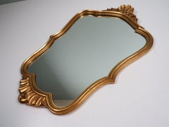 Belgian 1960s Hollywood Regency Gilt Mirror by Geratal with Floral Carved Detail
