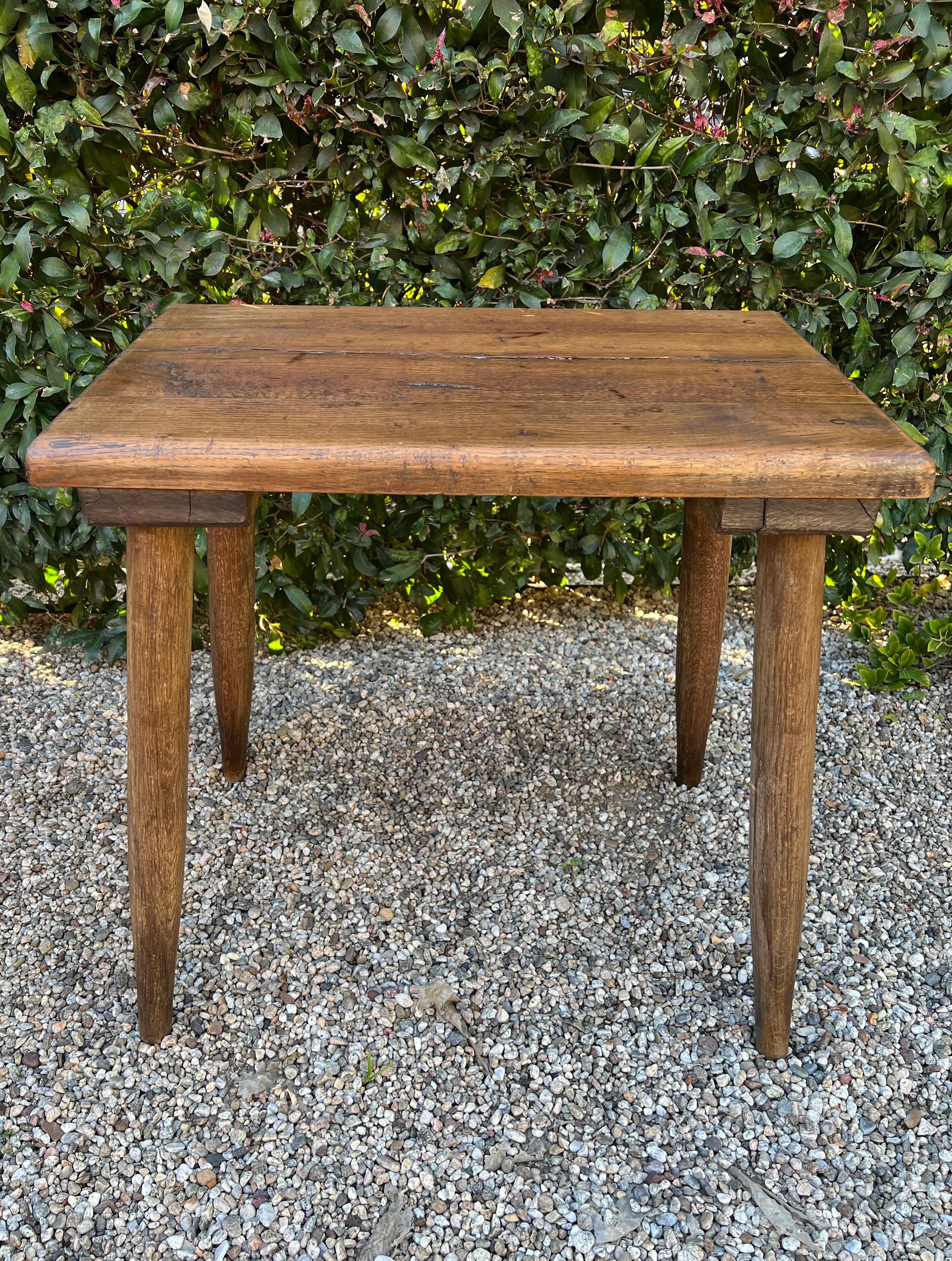 Sturdy Belgian farm side table. Hand crafted in the 19th century, this table is ready to support your room. Gorgeous wood patination reveals the long, beautiful life of this wood. A perfect compliment to any living room or entryway. Or, place